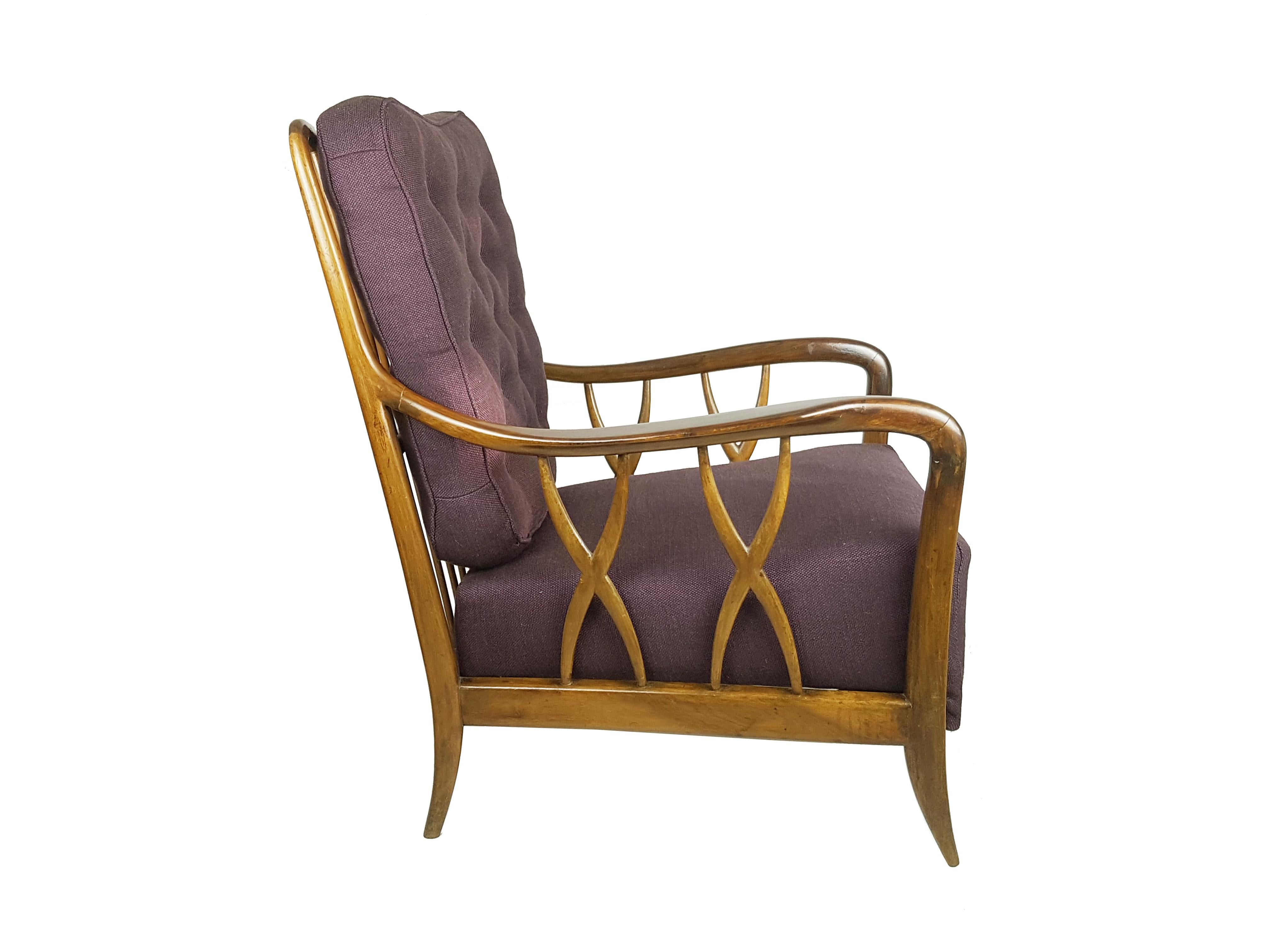 Wonderful armchair in wooden structure with purple fabric upholstered cushions. Due to its style and high quality the armchair has been attributed to the 1940-50s Paolo Buffa's production.
Partially restored and refinished. Cushions have been