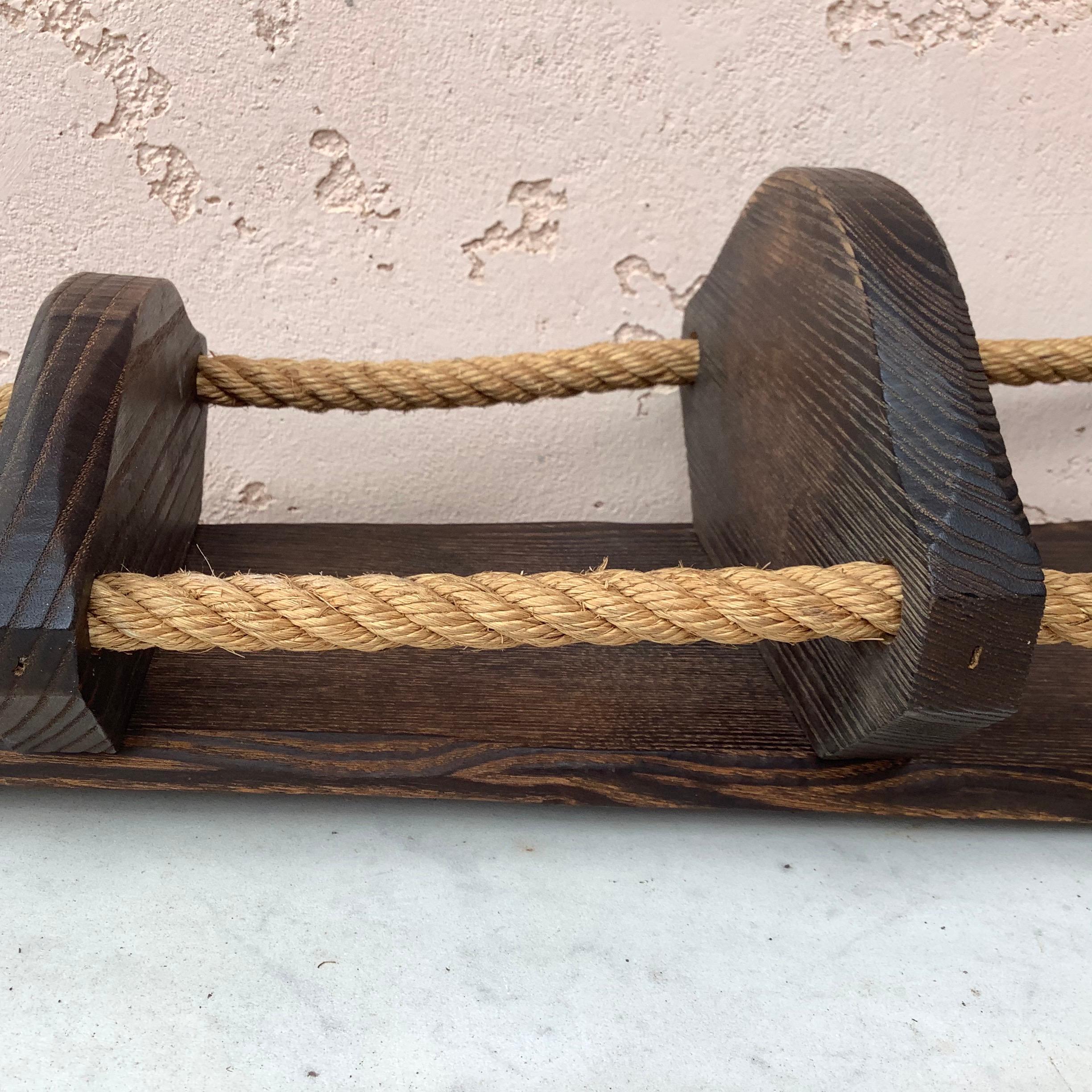 wooden rope shelf
