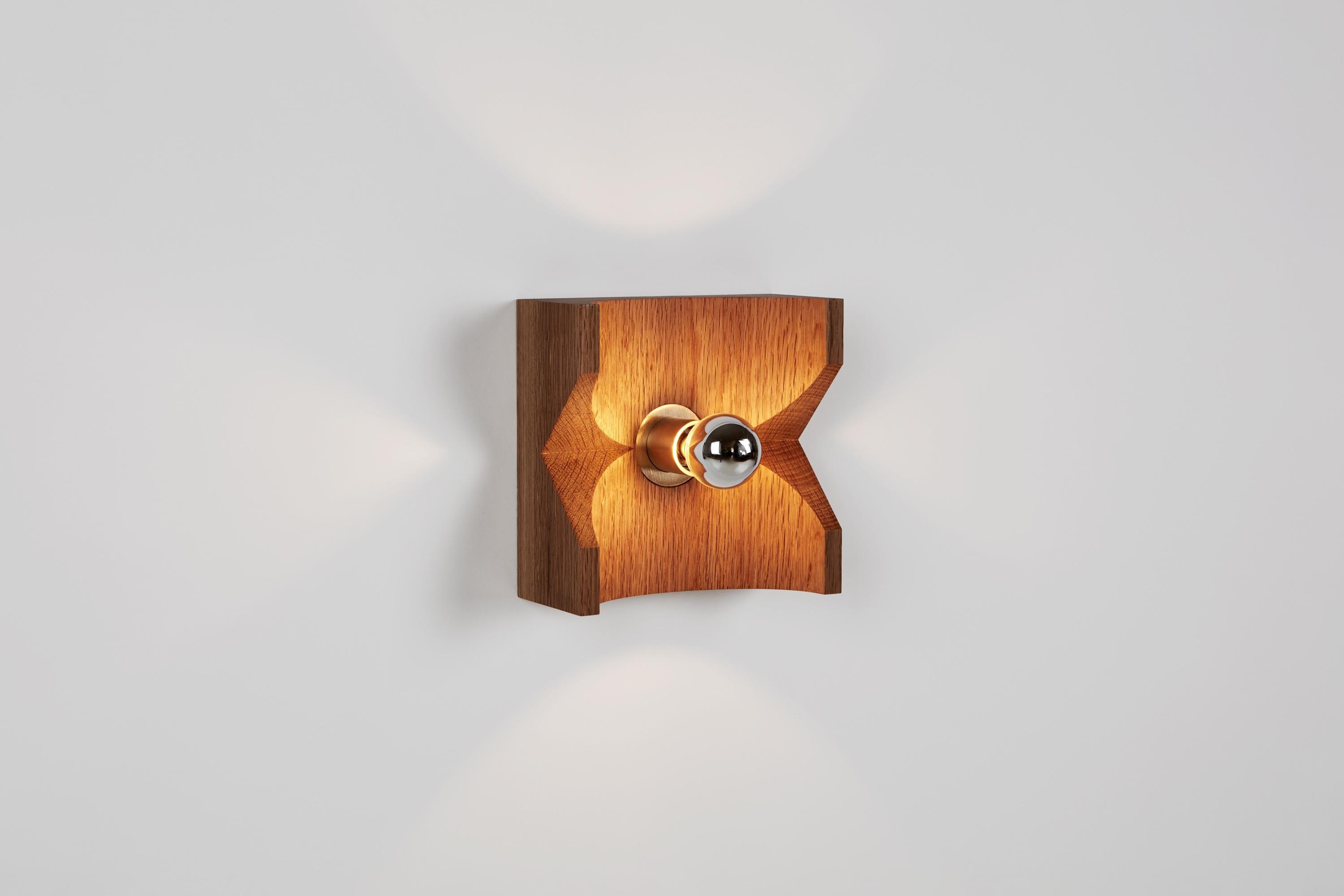 This Minimalist wooden sconce is a tribute to BGW's love of skateboarding. These miniature halfpipes host a central light bulb, the sculptural semi-circular center holds the light and allows it to escape onto the wall.

1 E12 socket, max 60W
4W