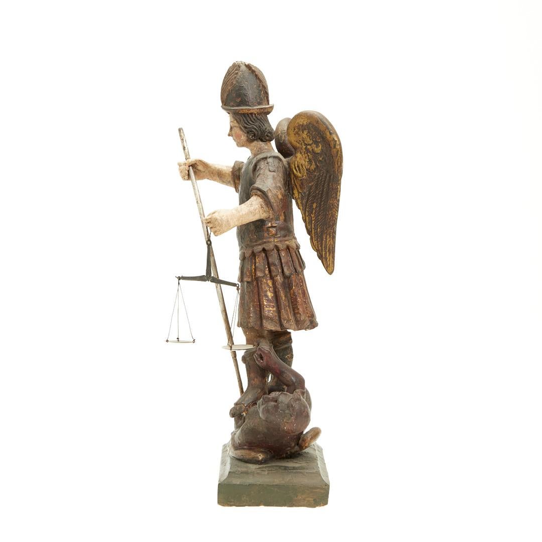Wood sculpture depicting Archangel Michael. Probably late 16th century. / early 17th century, Germany.

The sculpture is made of wood, polychrome and partially gilded, with the depiction of the Archangel Michael in antique armor, standing on a