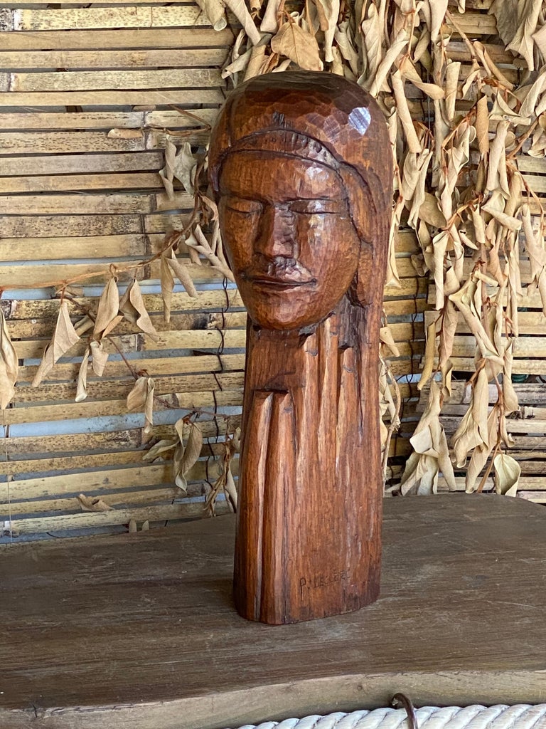 This sculpture is in solid wood. Hand carved by a french artist in the 1950's
It is signed P.Leclerc.