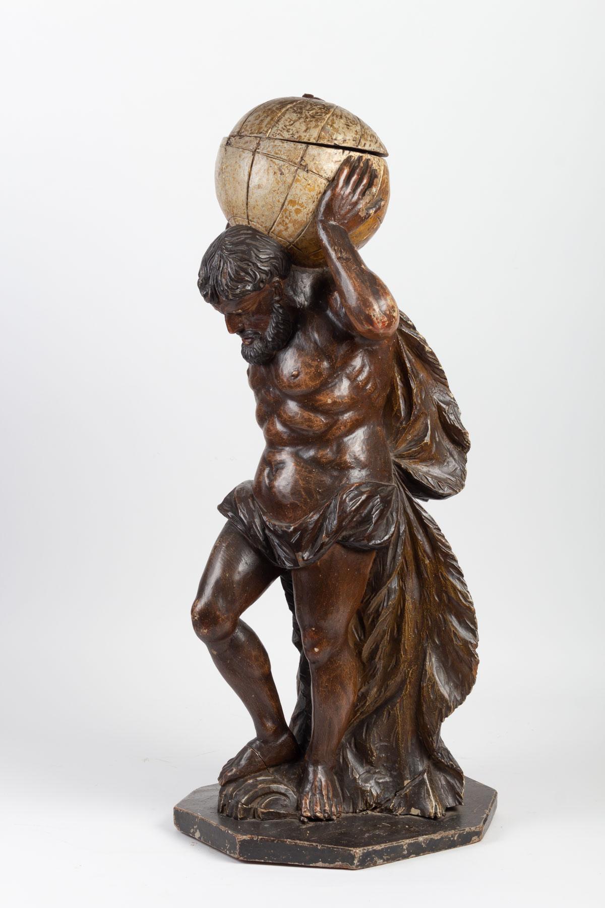 Wood sculpture carved and Polychromy, representing Atlas, 18th century
Measures: H 82 cm, W 32 cm, D 32 cm.