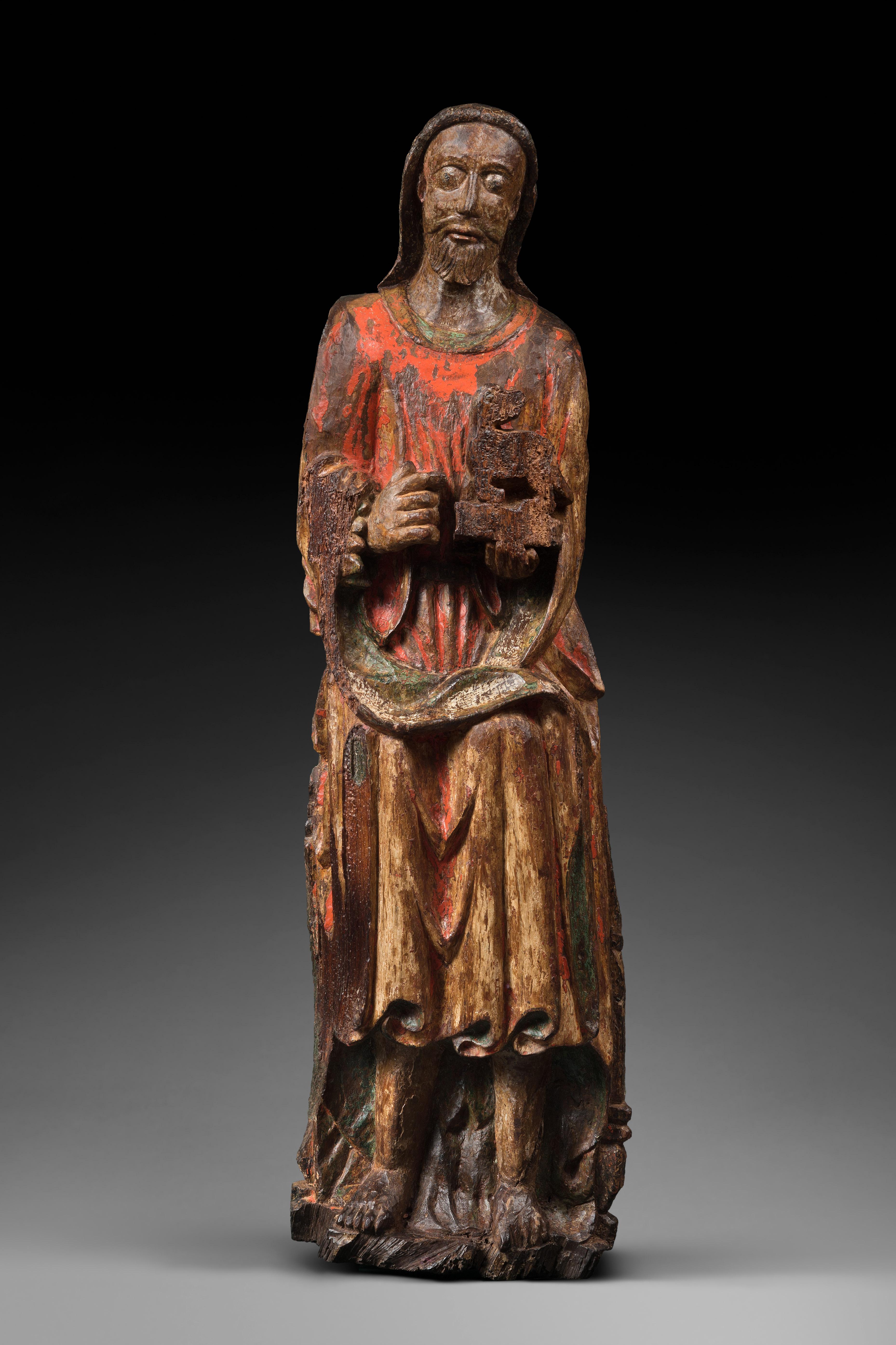 This wood scultpure showing fine traces of polychromy depicts John the Baptist, one the Old Testament’s last prophets and the first martyr of the New Testament. He is easily recognizable with the lamb he is carrying in his left hand. The way the