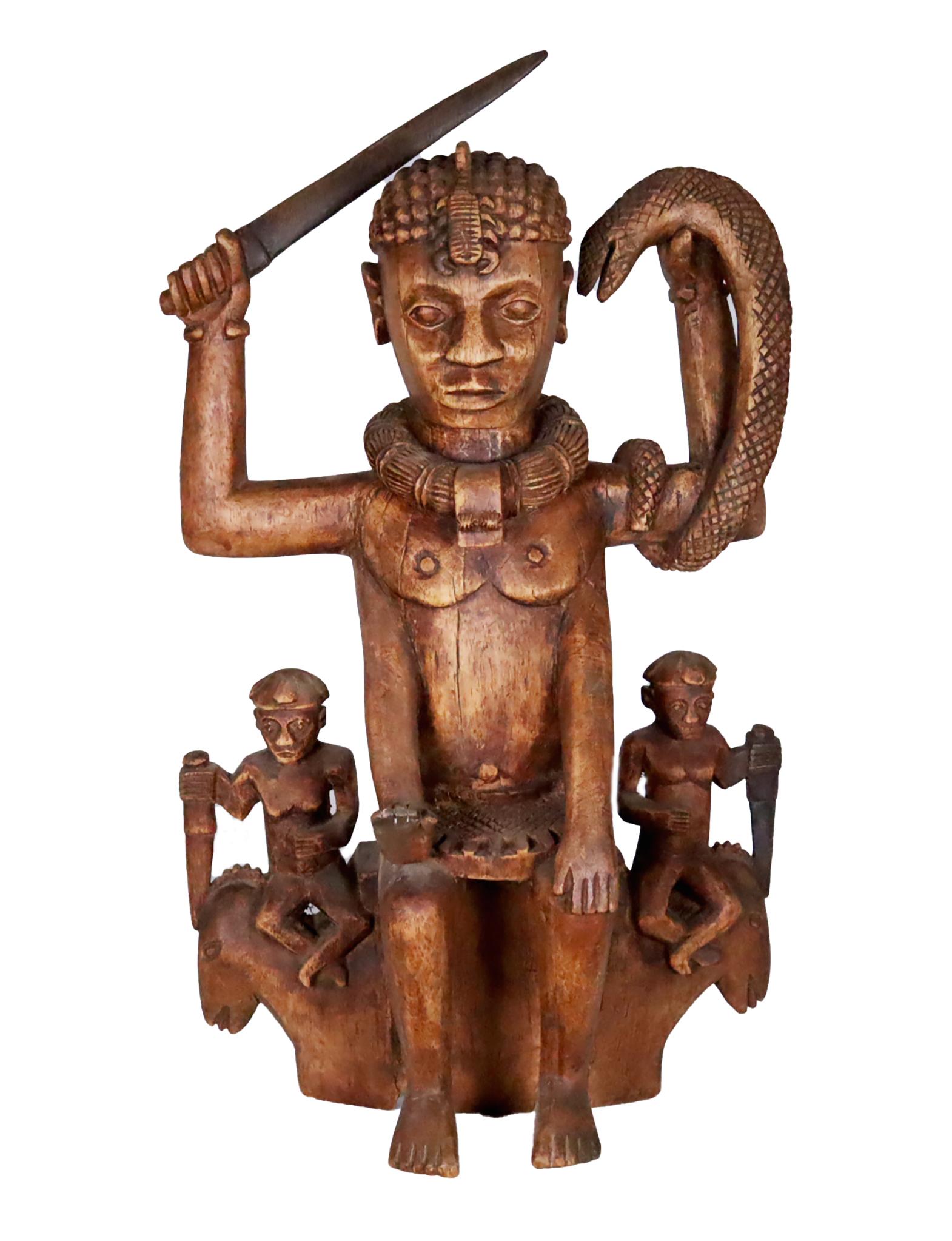 An unusual and rare androgynous type of the popular West African deity Mami Wata or possibly a type of the male version Papi Wata. The cult of Mami Wata extends from Senegal all the way into Angola and has many different names and expressions. Like