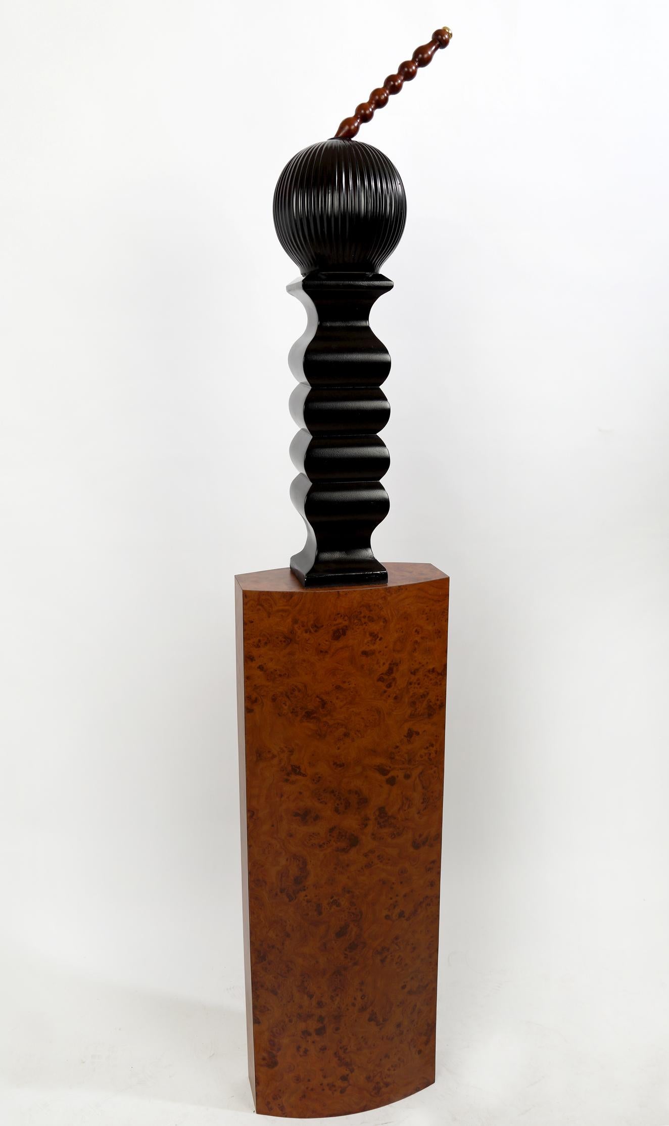 Escultura de madera titulada 