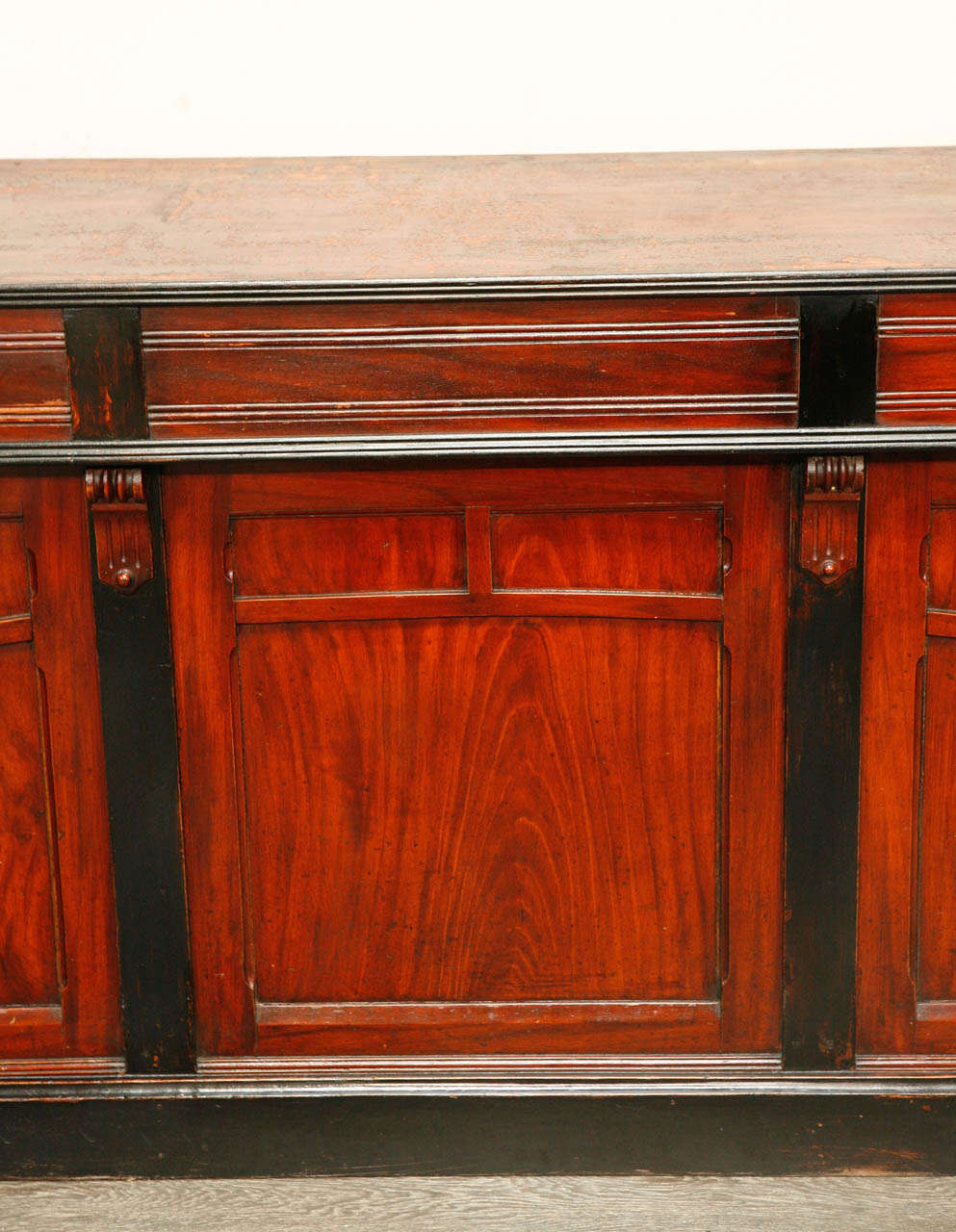 Traditional 19th-century Belgian shop counter with original painted finish. Functional as a sideboard or credenza, this handsome and well-patinated piece is a beautiful combination of form and function.  

Belgium, circa 1860

Dimensions: 79W x 23D
