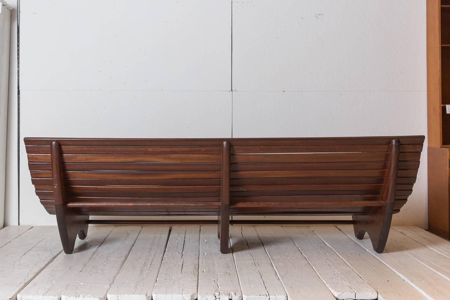 Wood Stained Brazilian Curved Slatted Bench with Three Legs 1