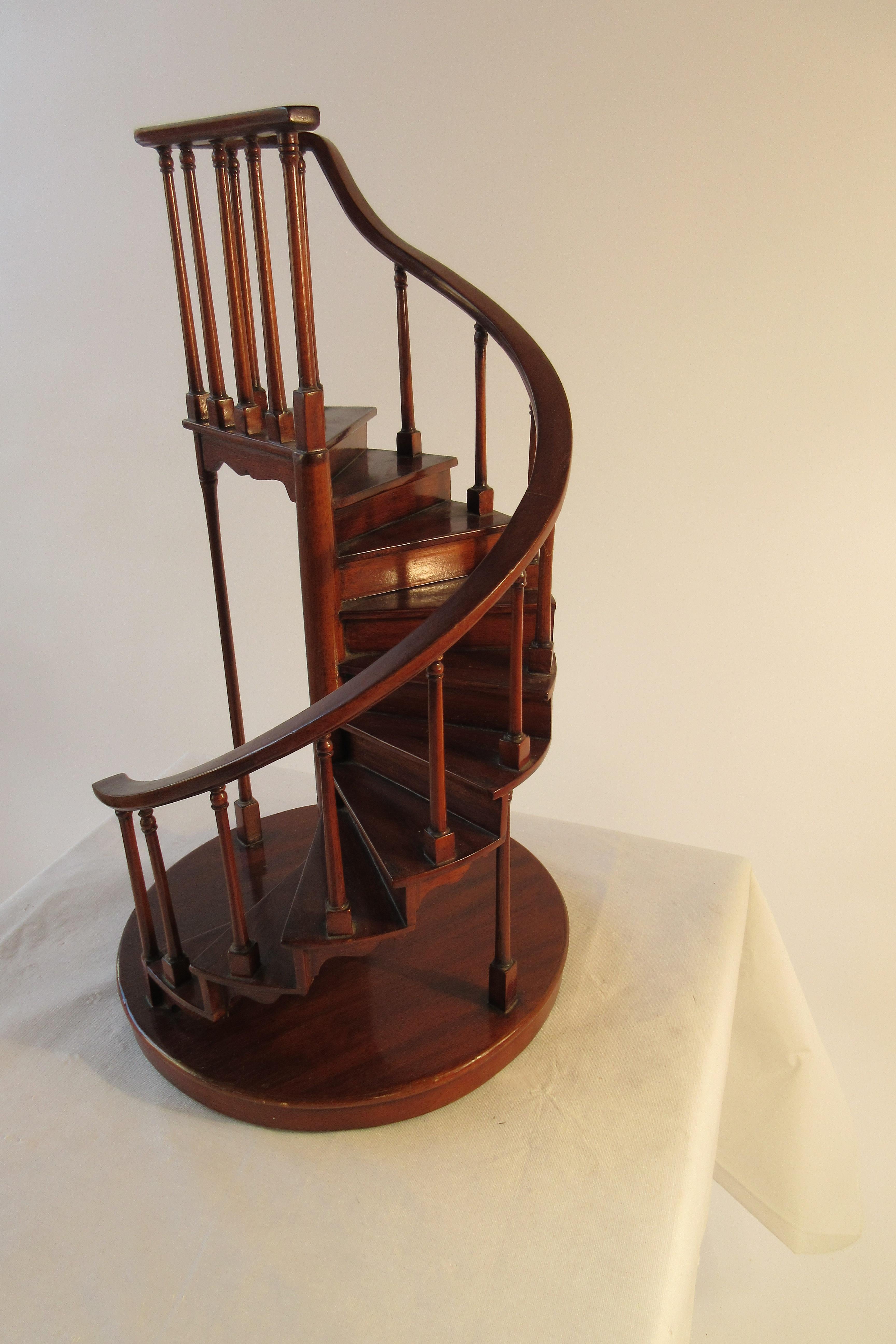 Wood staircase model. One piece of fretwork missing from side, as seen in image 9, on the 5th step.