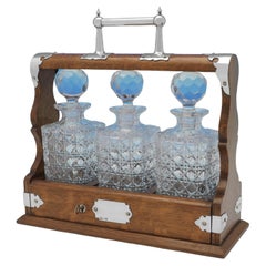 Wood & Sterling Silver Tantalus with 3 Original Decanters, Hallmarked in 1925