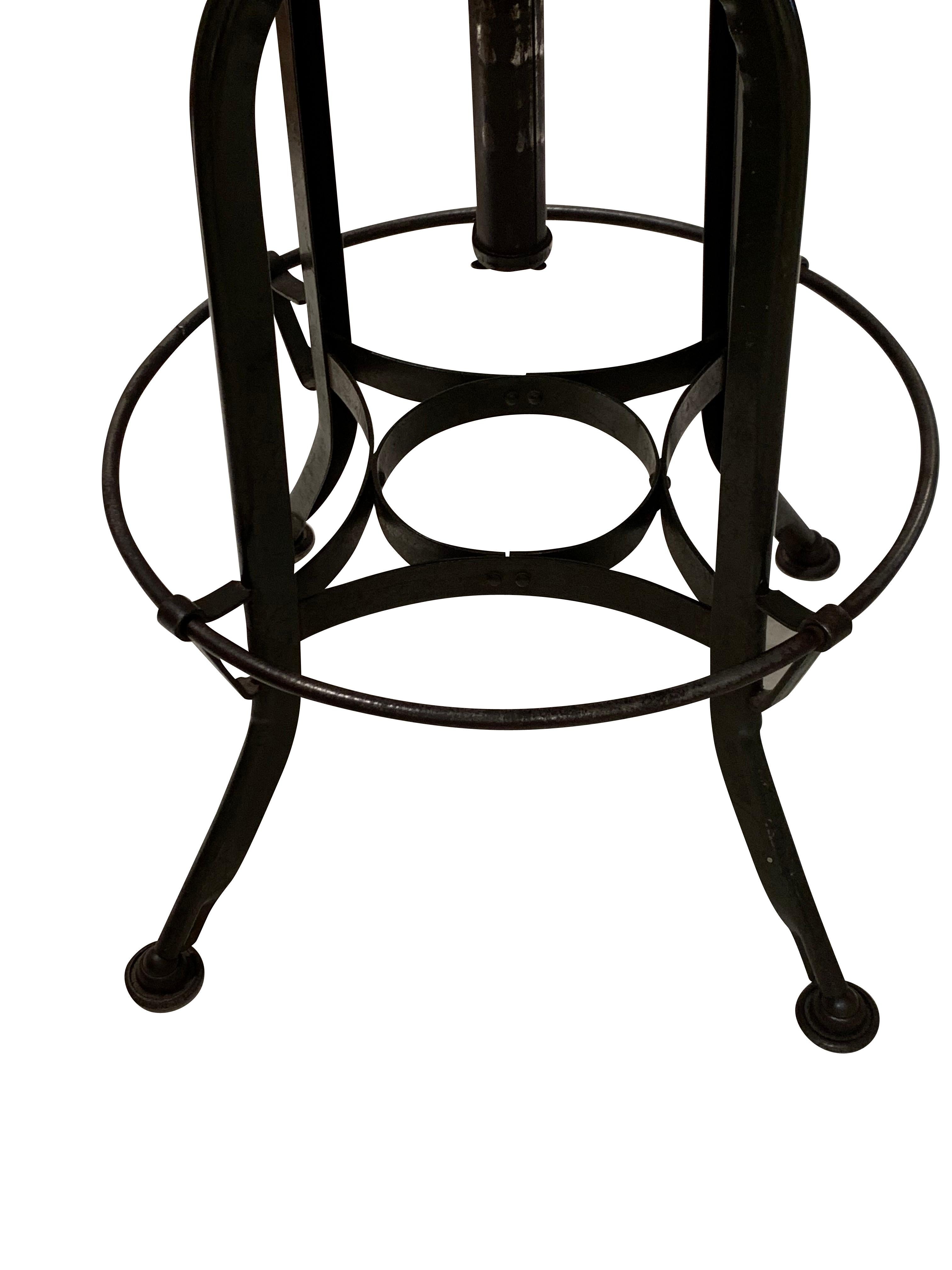 Mid century American Toledo barstool.
Wood swivel top and steel base
Seat diameter 15