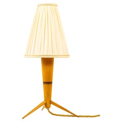 Wood table lamp with fabric shade around 1950s