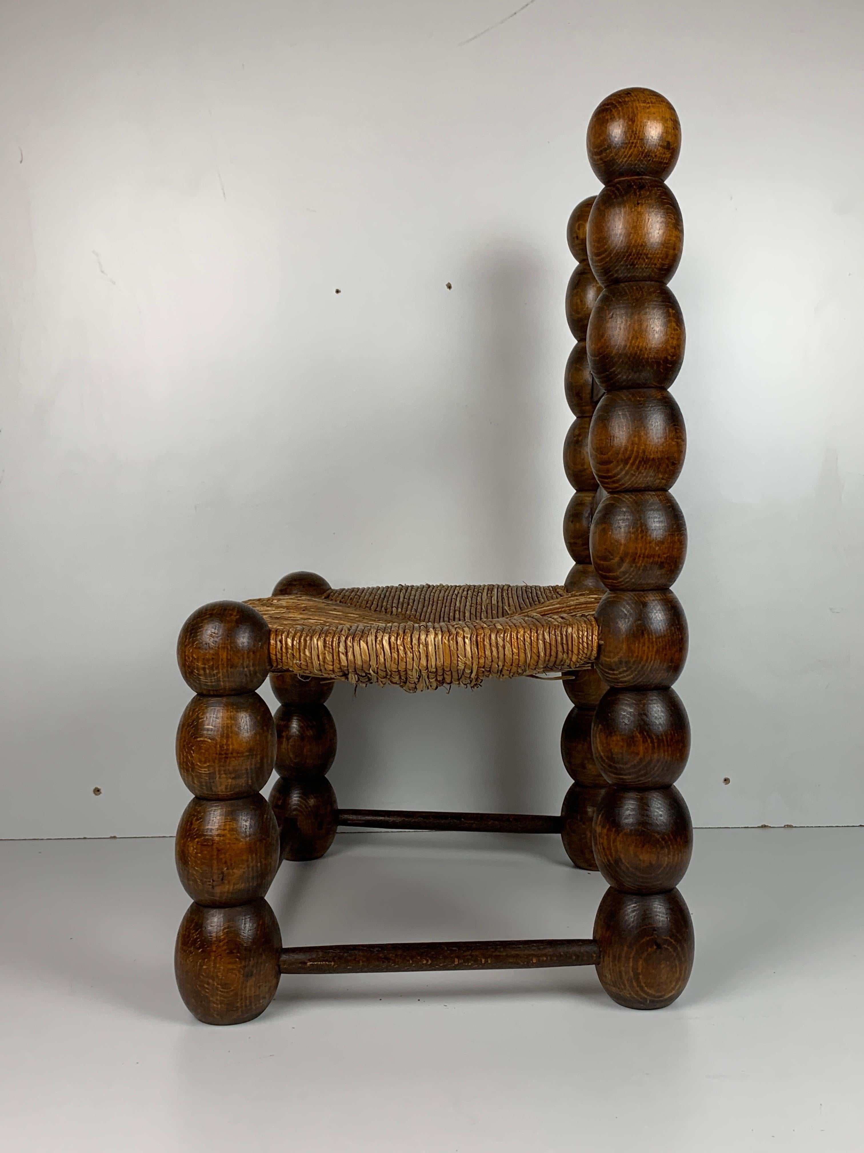 Wood Turned Bobbin Low Rush Chair in the style of Charles Dudouyt, France, 1950s In Good Condition In Zaandam, NL