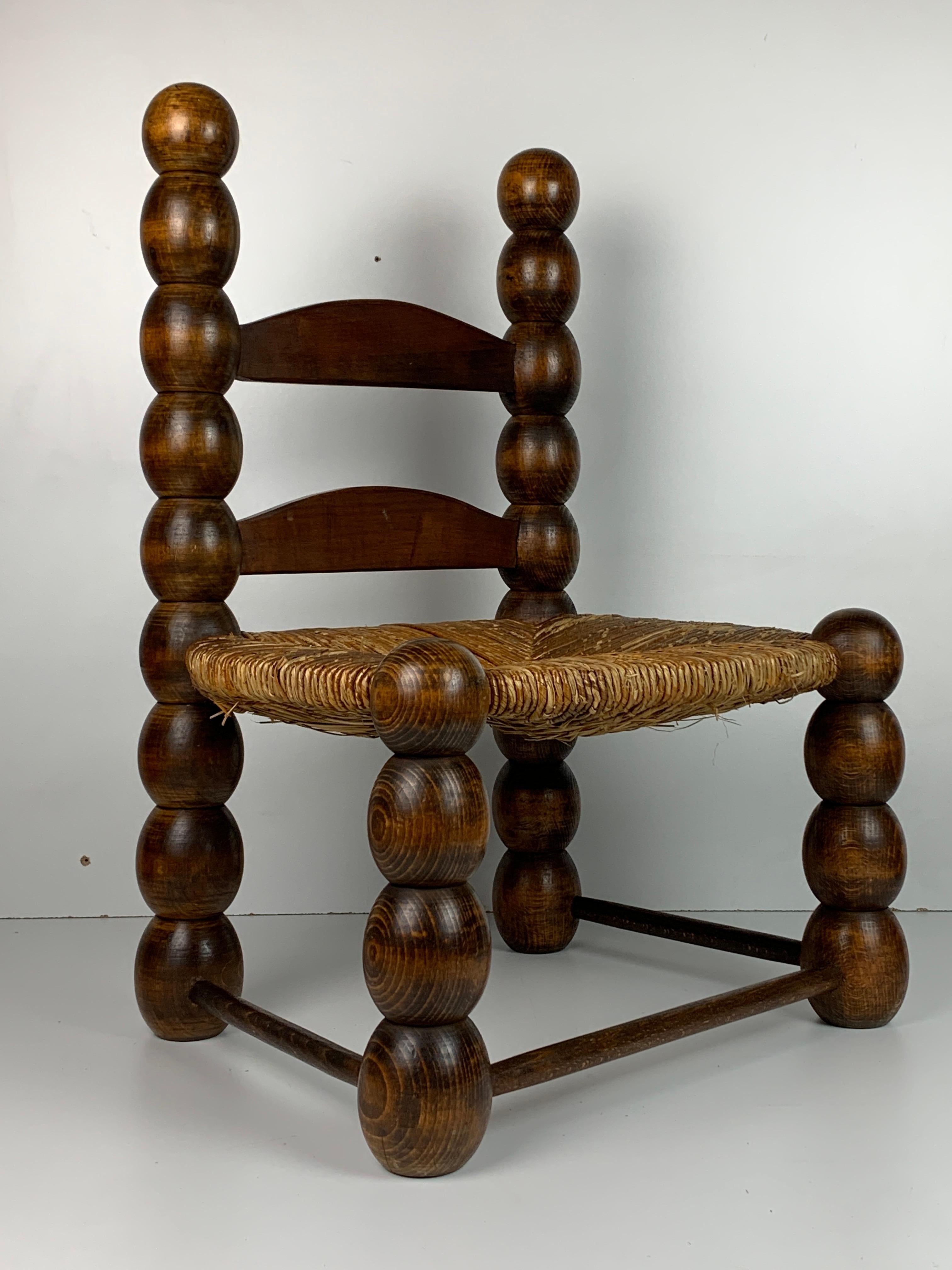Mid-20th Century Wood Turned Bobbin Low Rush Chair in the style of Charles Dudouyt, France, 1950s