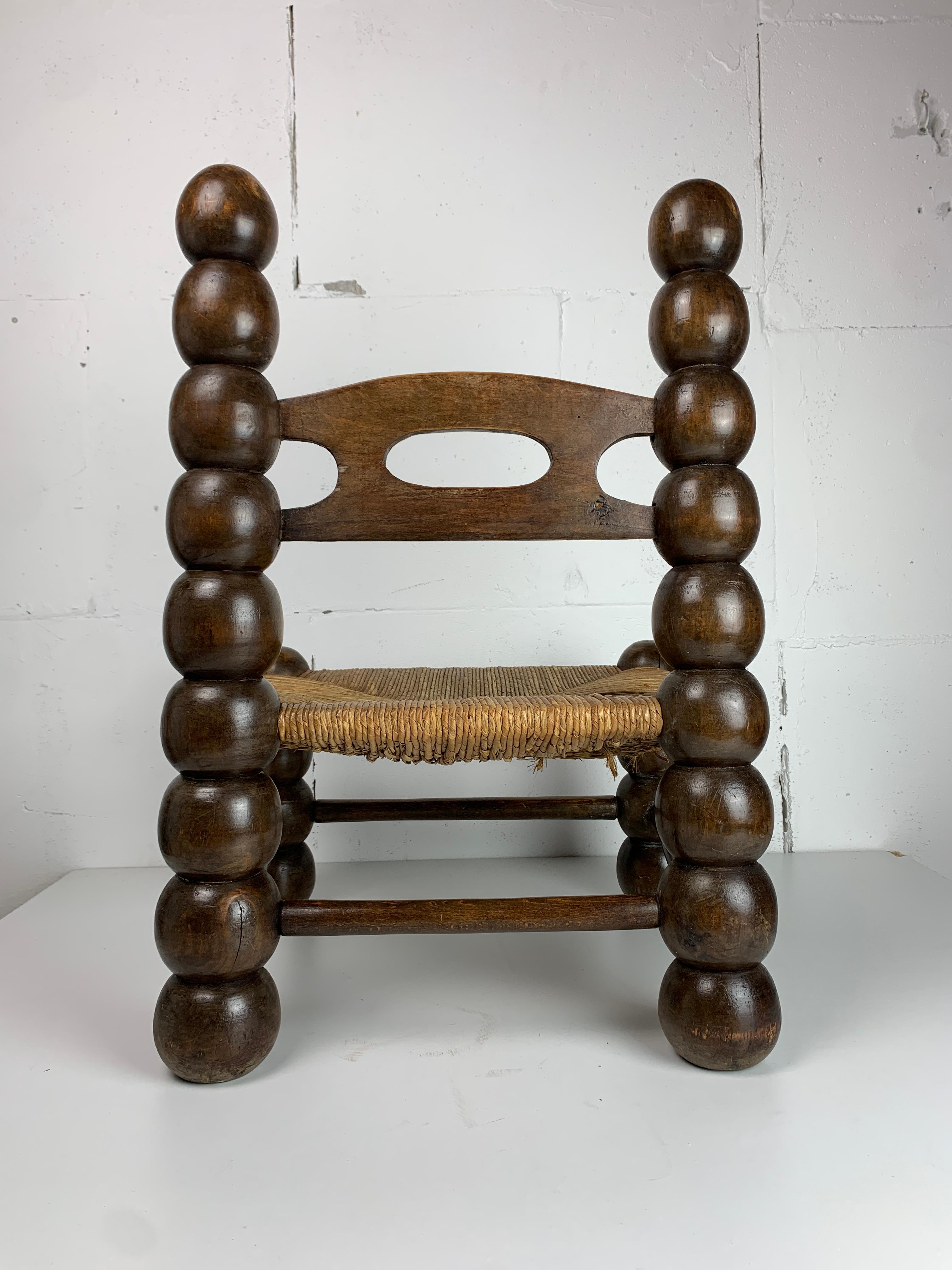 Mid-20th Century Wood Turned Bobbin Low Rush Chair in the style of Charles Dudouyt, France, 1950s