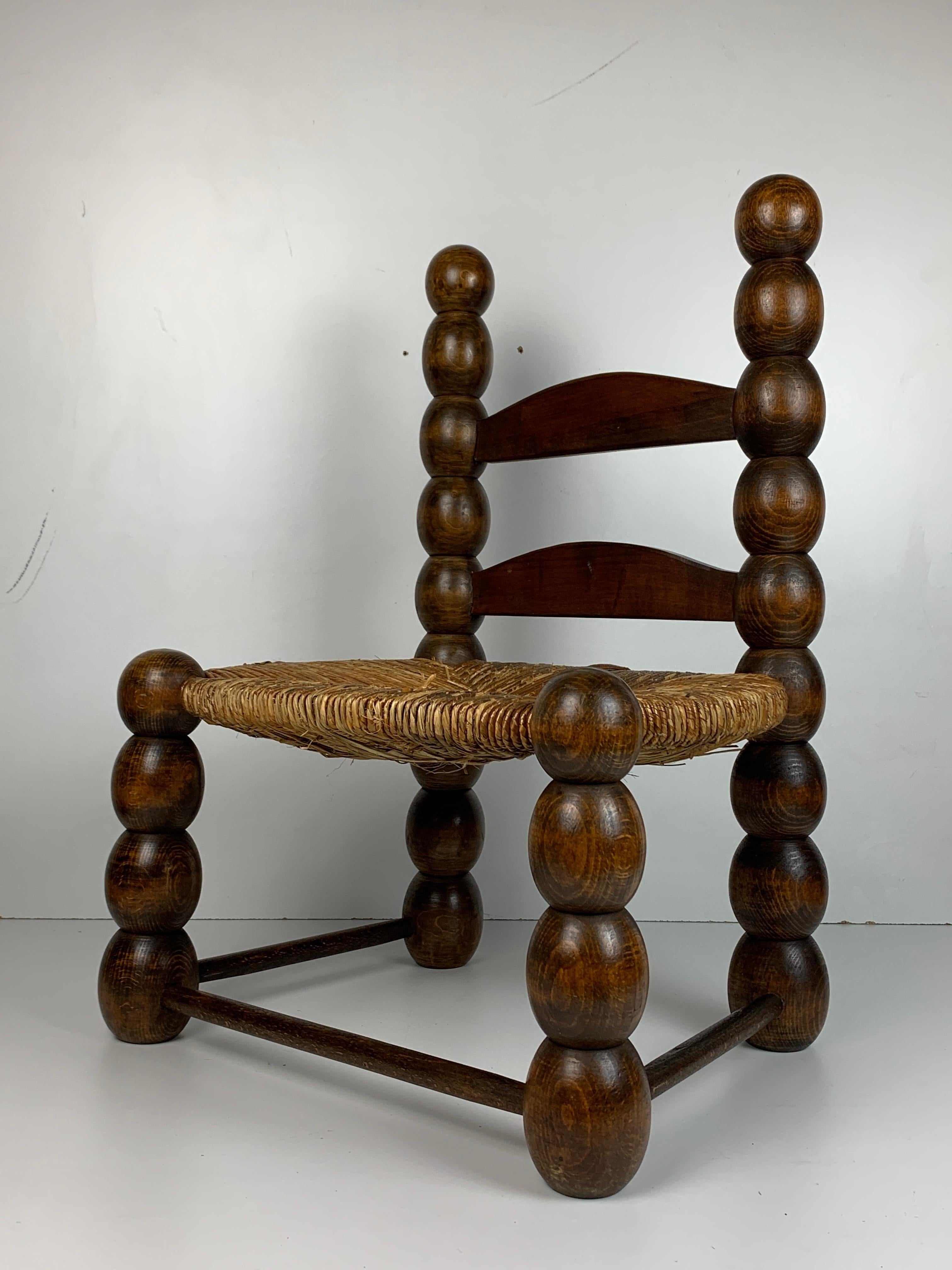 Wood Turned Bobbin Low Rush Chair in the style of Charles Dudouyt, France, 1950s 1