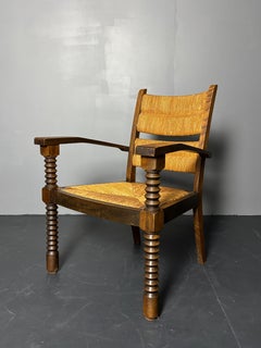 Fauteuil en jonc tourné en bois dans le style de Charles Dudouyt, France années 50