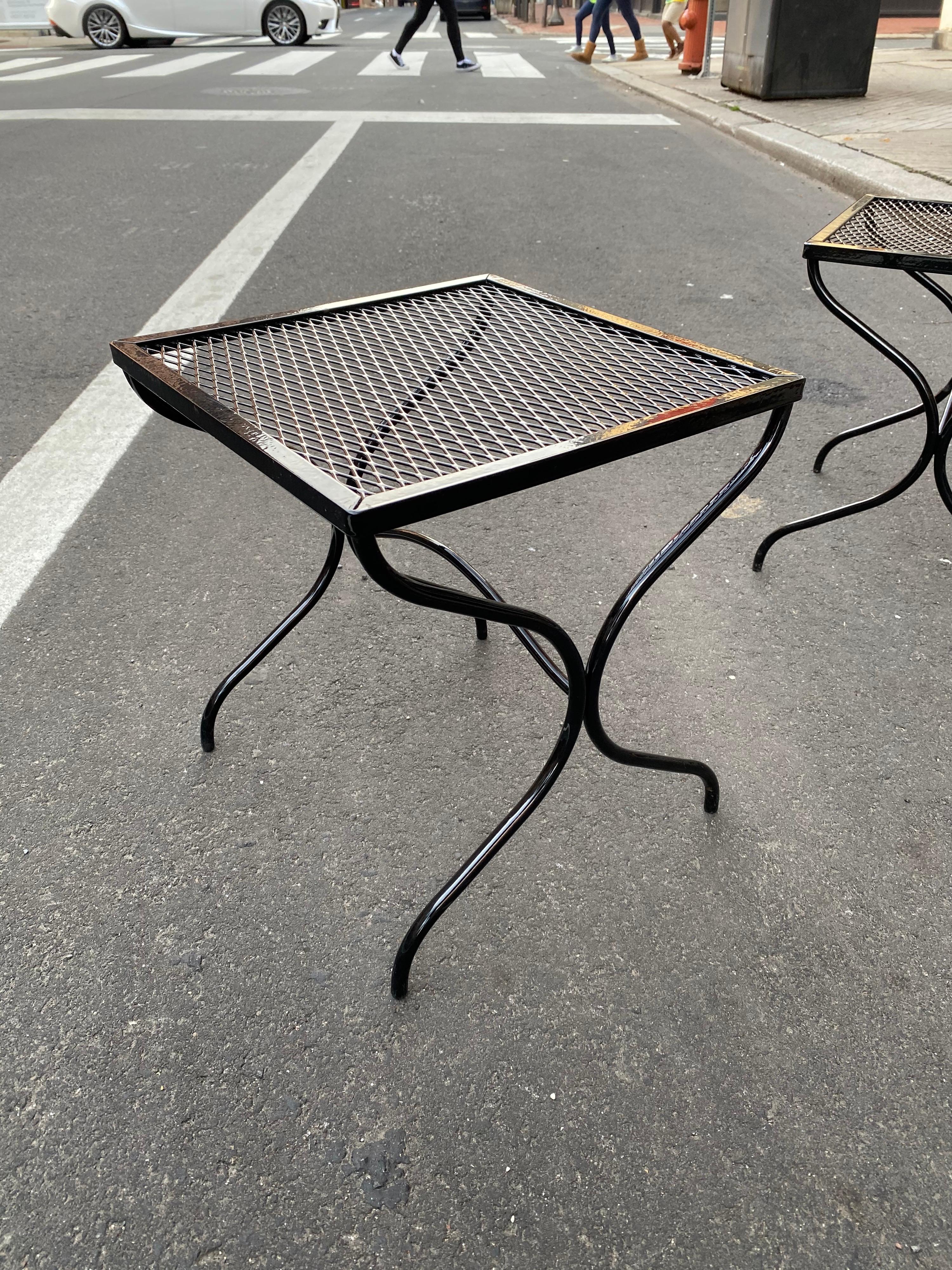 Woodard patio iron table set. 3 small tables with metal grid tops. Tables have been newly powder coasted black. Very nice Condition!
