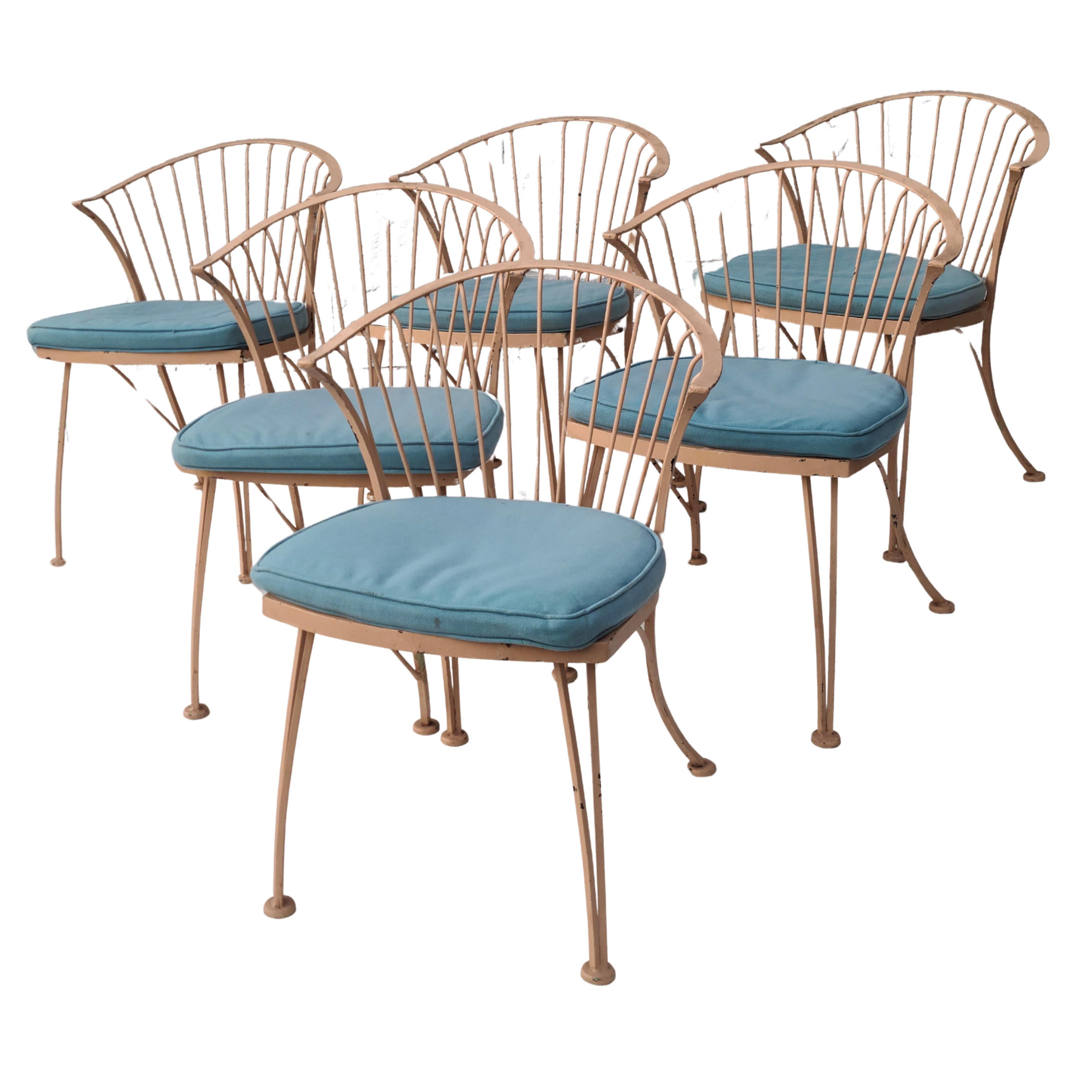 Set of 6 Dining Chairs.
Woodard Pinecrest Series.

Older Tan Paint over original black.
Aqua cushions still somewhat flexible.