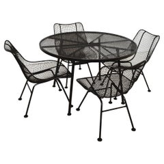 Woodard Sculptura Patio Set with Table and Four Chairs