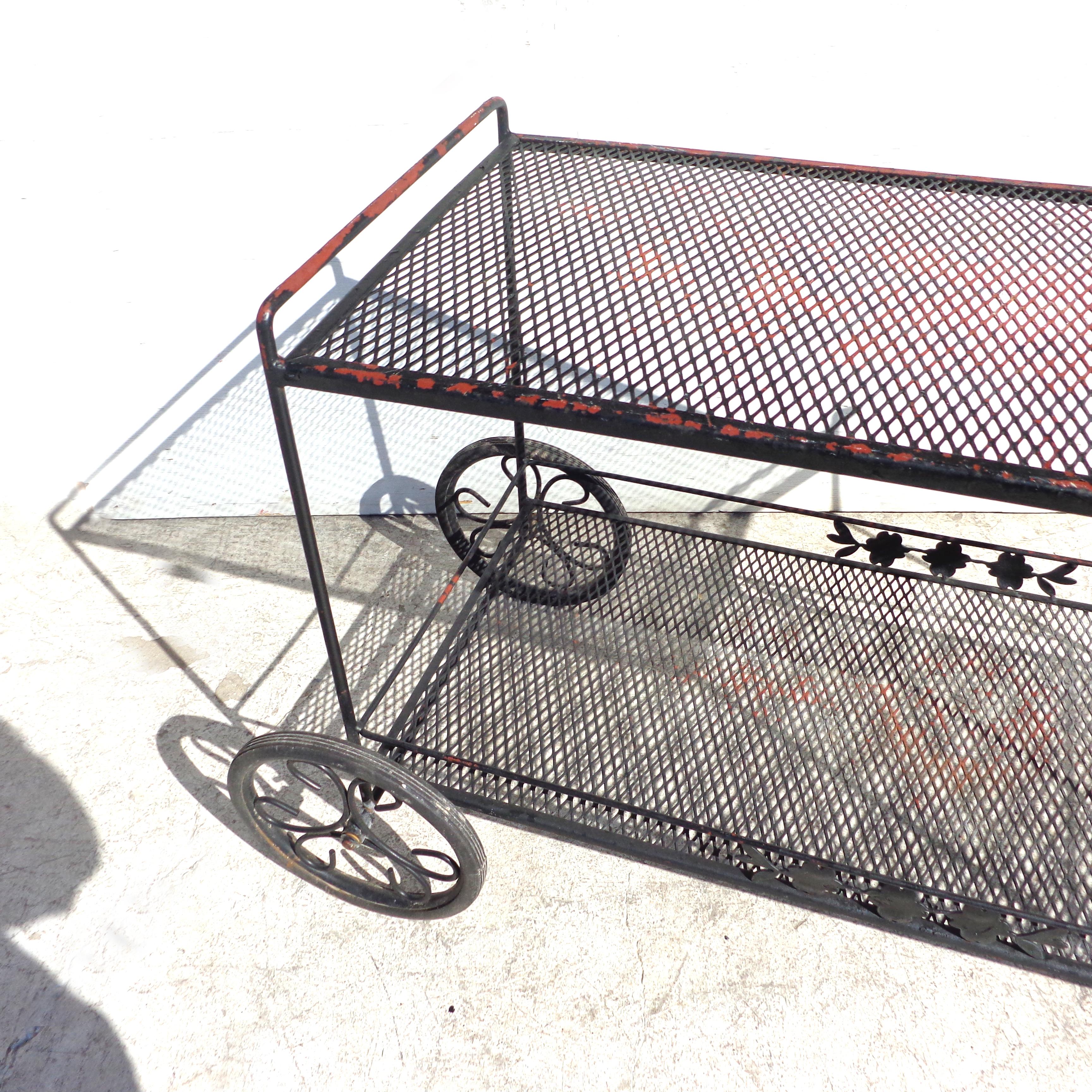 wrought iron cart with wheels