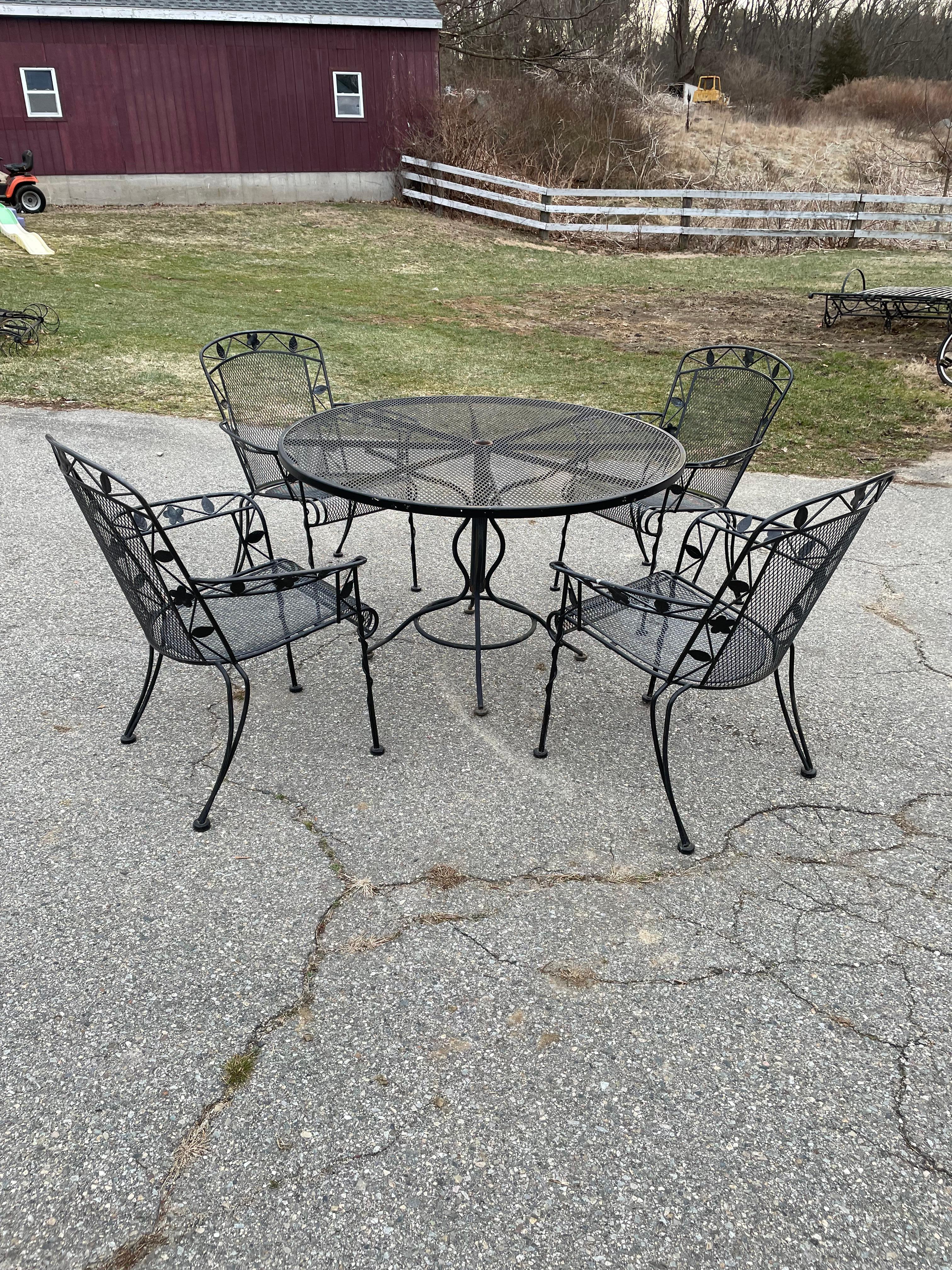 Woodard Wrought Iron Dining Set

5 Piece Outdoor Dining Set perfect for any deck, garden, or patio. Mesh top table with attractive base with maker’s mark and 4 high back Arm Chairs with floral motif. 48” Round Table.

Ships for flat rate of 379