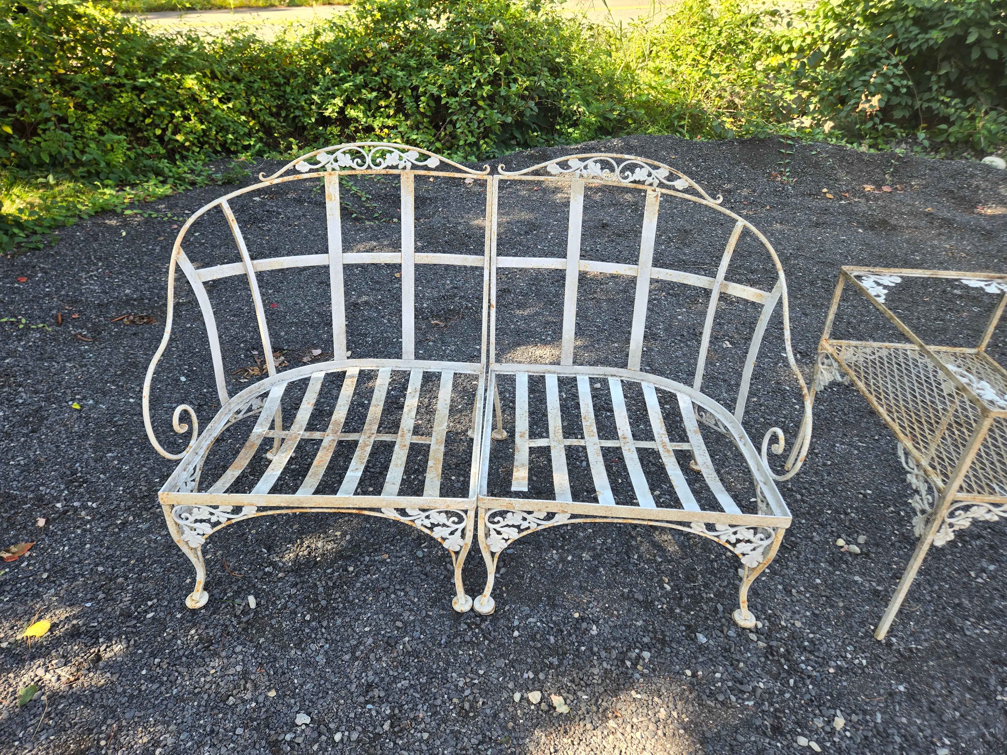 Upgrade your outdoor living space with this Vintage Woodard Wrought Iron Outdoor Patio Furniture Set. This set features a deep seated loveseat measuring 24