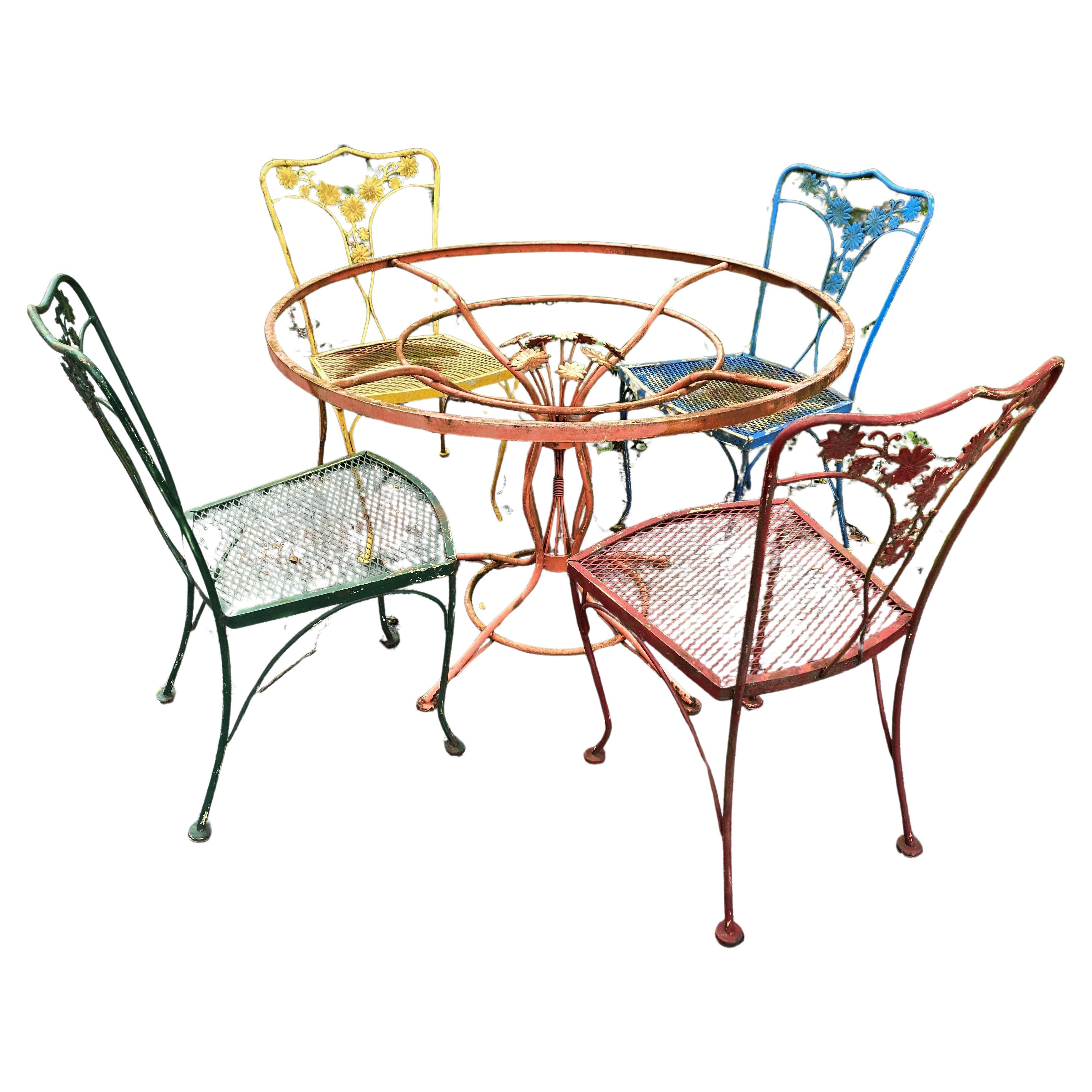 Woodard Wrought Iron Patio Table with Flower Center & 4 Chairs For Sale