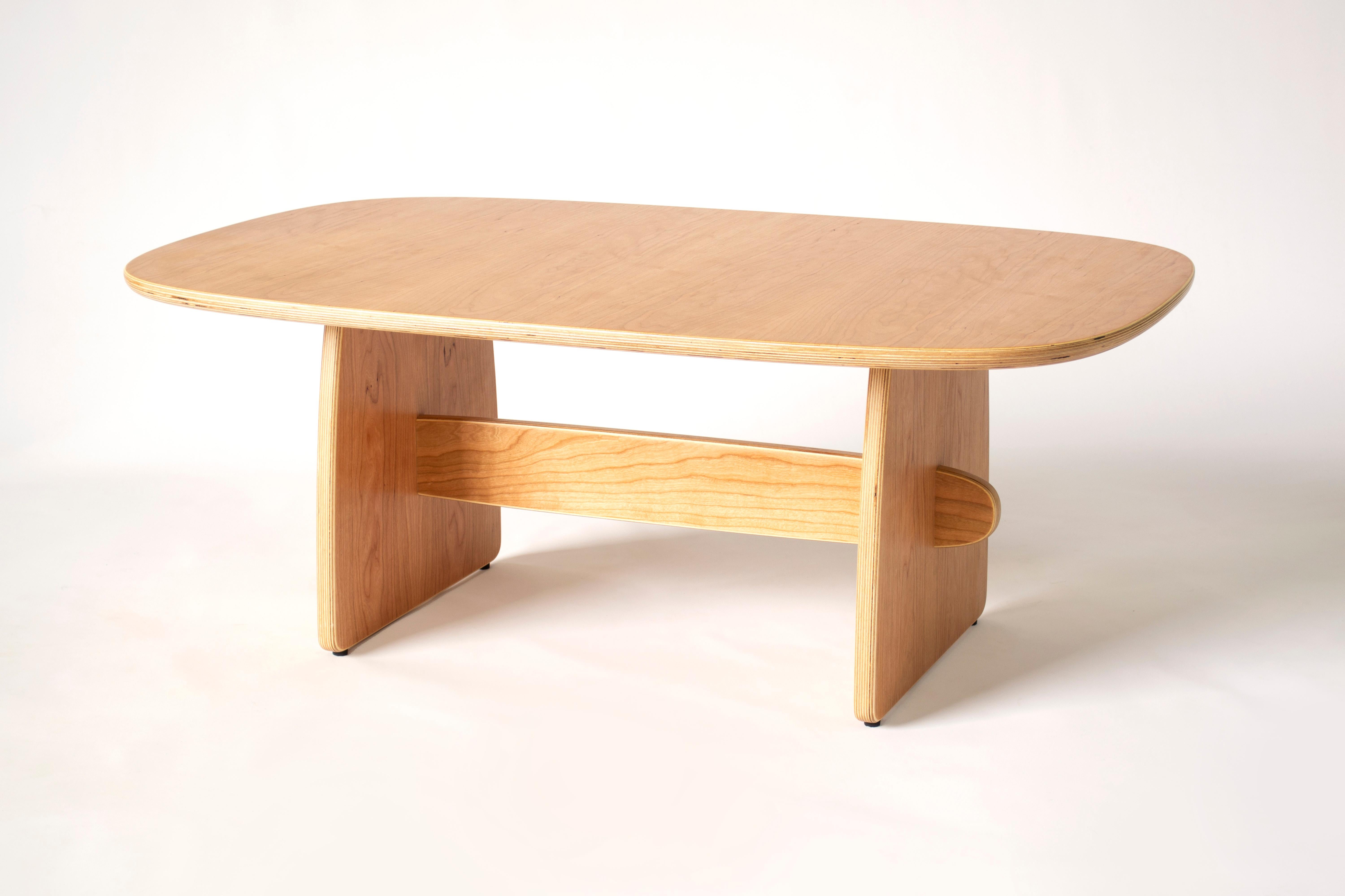 The Woodbine coffee table is made from thick hardwood plywood and cherry veneer with a hand rubbed oil finish. The playful base brings a bright and cheery pop to any space. Custom sizes and material options available, Please see the additional