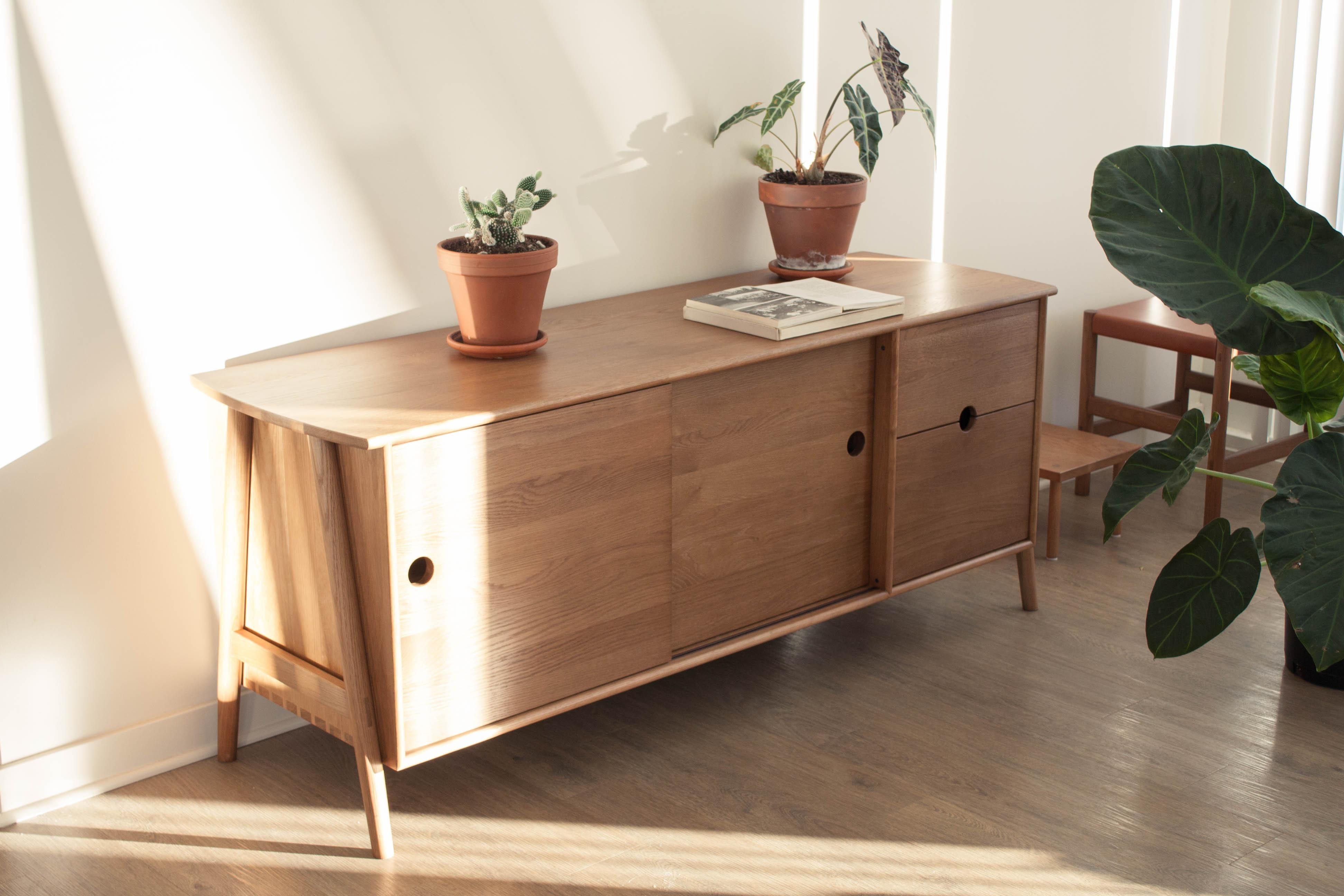 Sun at six is a Brooklyn design studio. We work with traditional Chinese joinery masters to handcraft our pieces using traditional joinery. The woodbine sideboard features dovetails and traditional joinery throughout.

• Solid white oak
• Tung