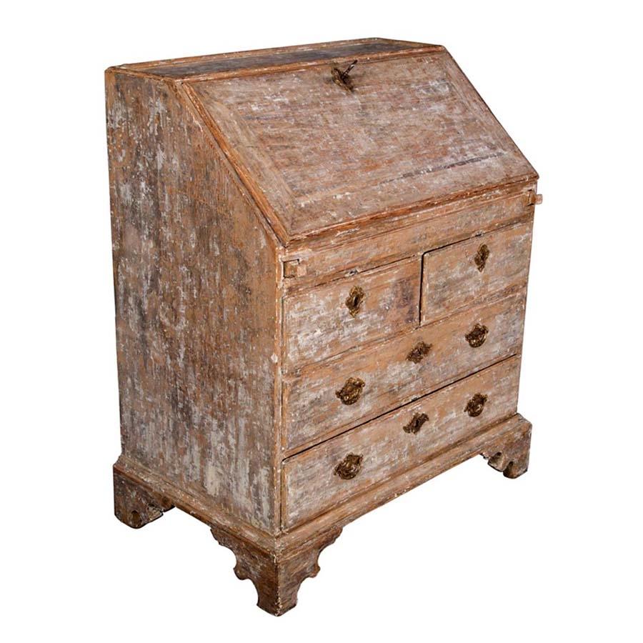 This wooden antique 18th century Swedish bureau has a dry scraped patina, with superb proportions and interior. The fall front lid reveals eight drawers and a number of small display areas. Beneath the fall top there are two half-width drawers and