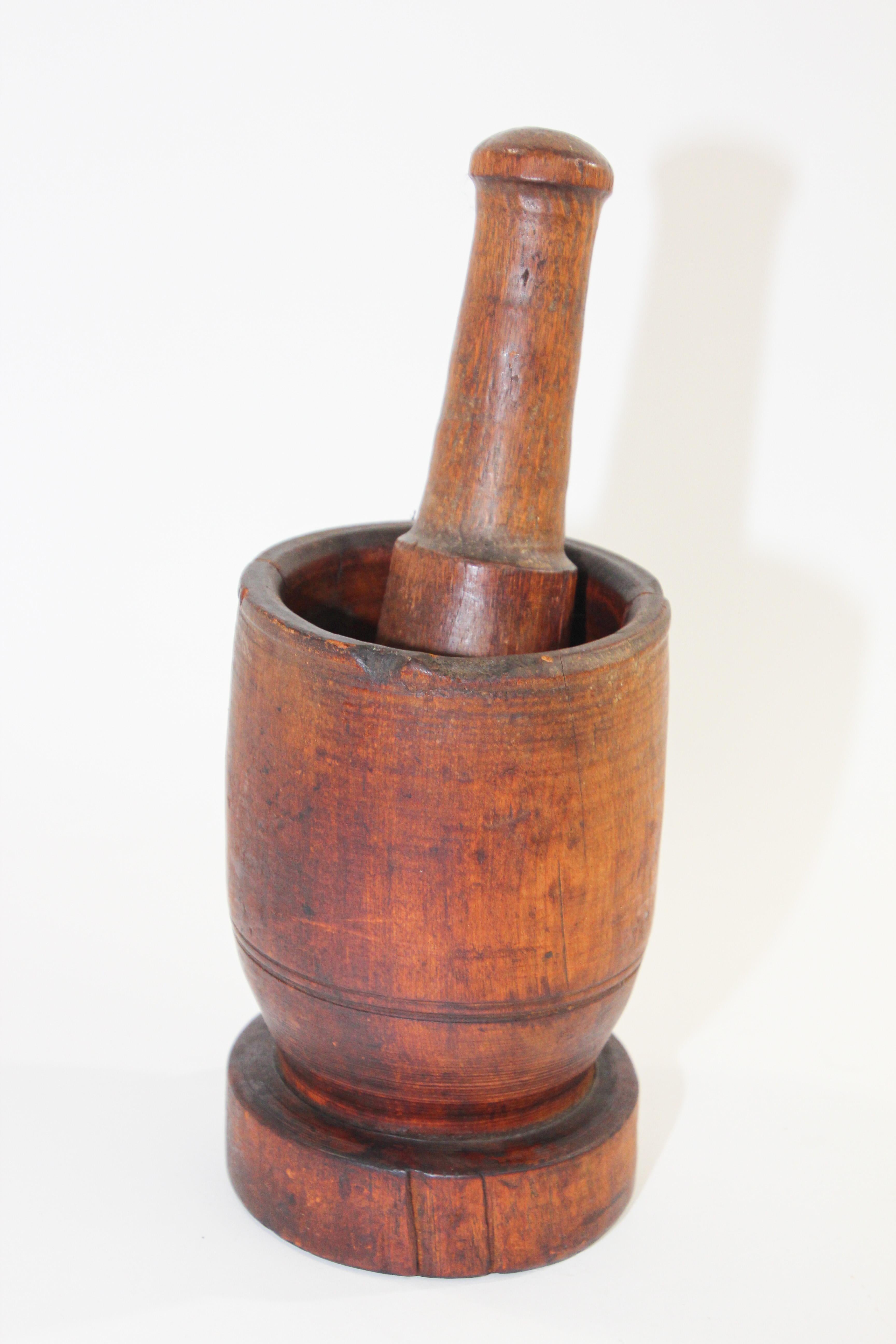Large wood antique American mortar and pestle.
Early 19th c. Americana turned wood footed mortar and pestle.
American, late 19th century wooden mortar and pestle.
The urn shaped mortar with rich patina has a wonderful warmth and feel.
Both pieces