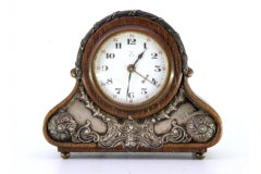 Wooden alarm clock with silver applications