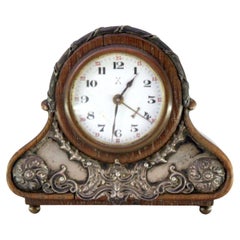 Wooden alarm clock with silver applications