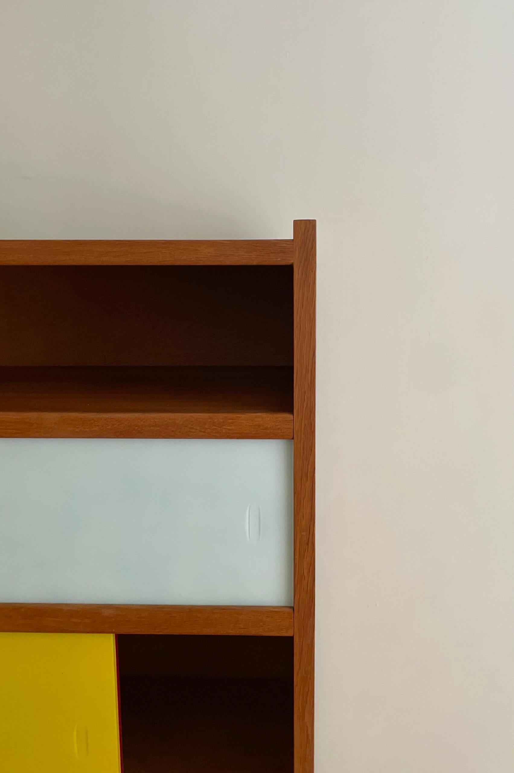 Mid-20th Century Wooden and coloured glass bookcase For Sale