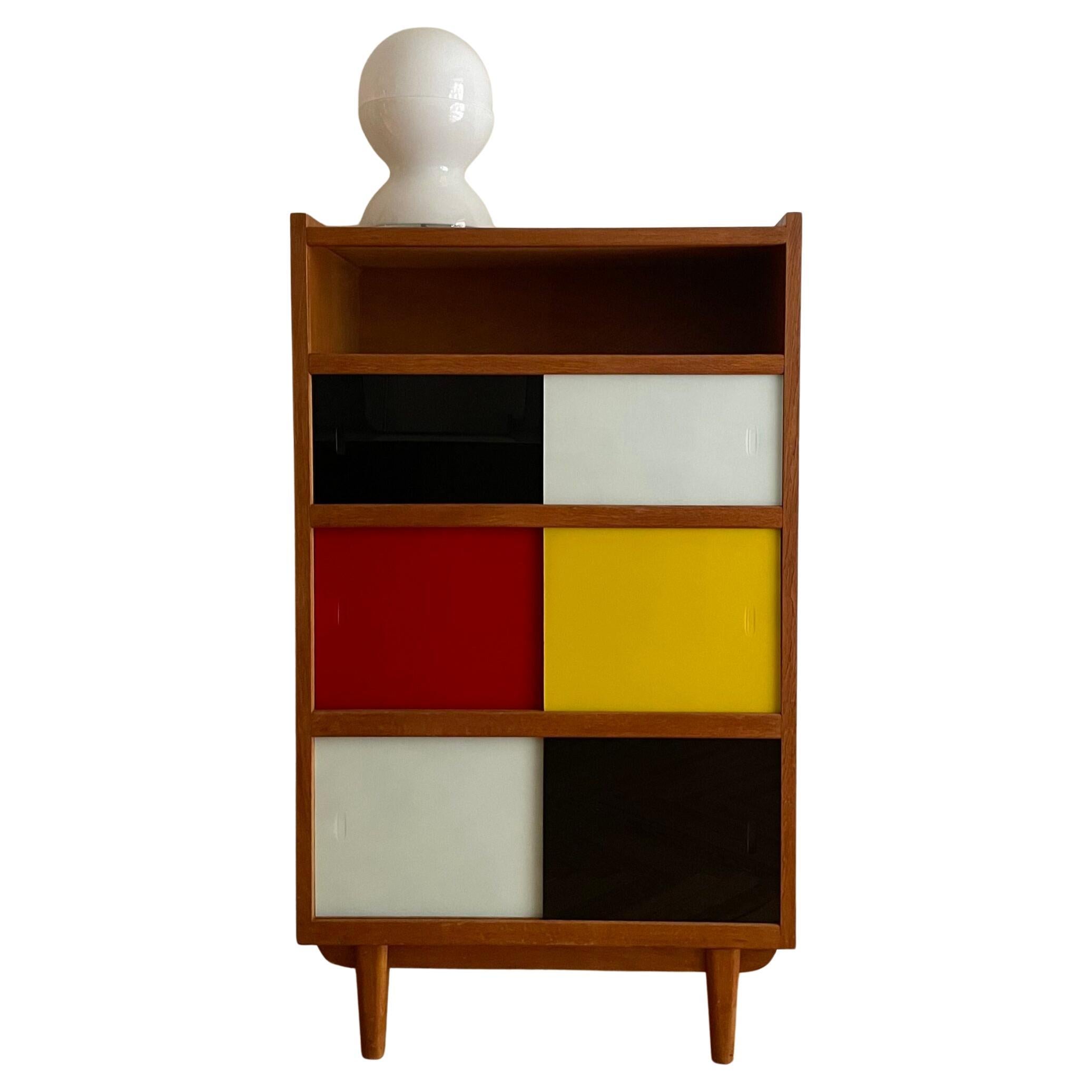 Wooden and coloured glass bookcase