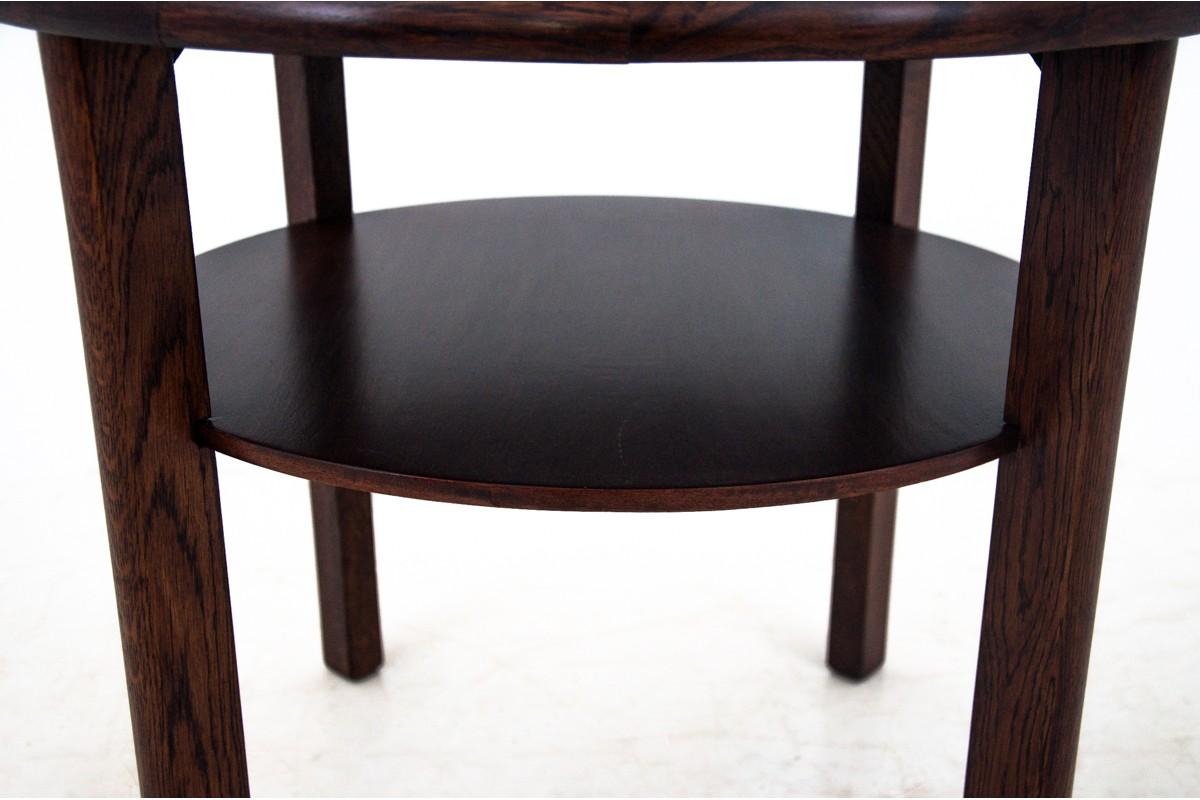 An antique table from the first half of the 20th century. Furniture in very good condition, after professional renovation.

Dimensions: height 61 cm / diameter 70 cm.