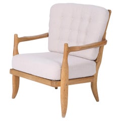 Wooden armchair by Guillerme and Chambron