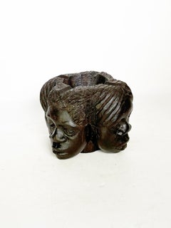Wooden ashtray with 4 sculpted heads, France, 1950