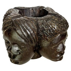 Wooden ashtray with 4 sculpted heads, France, 1950