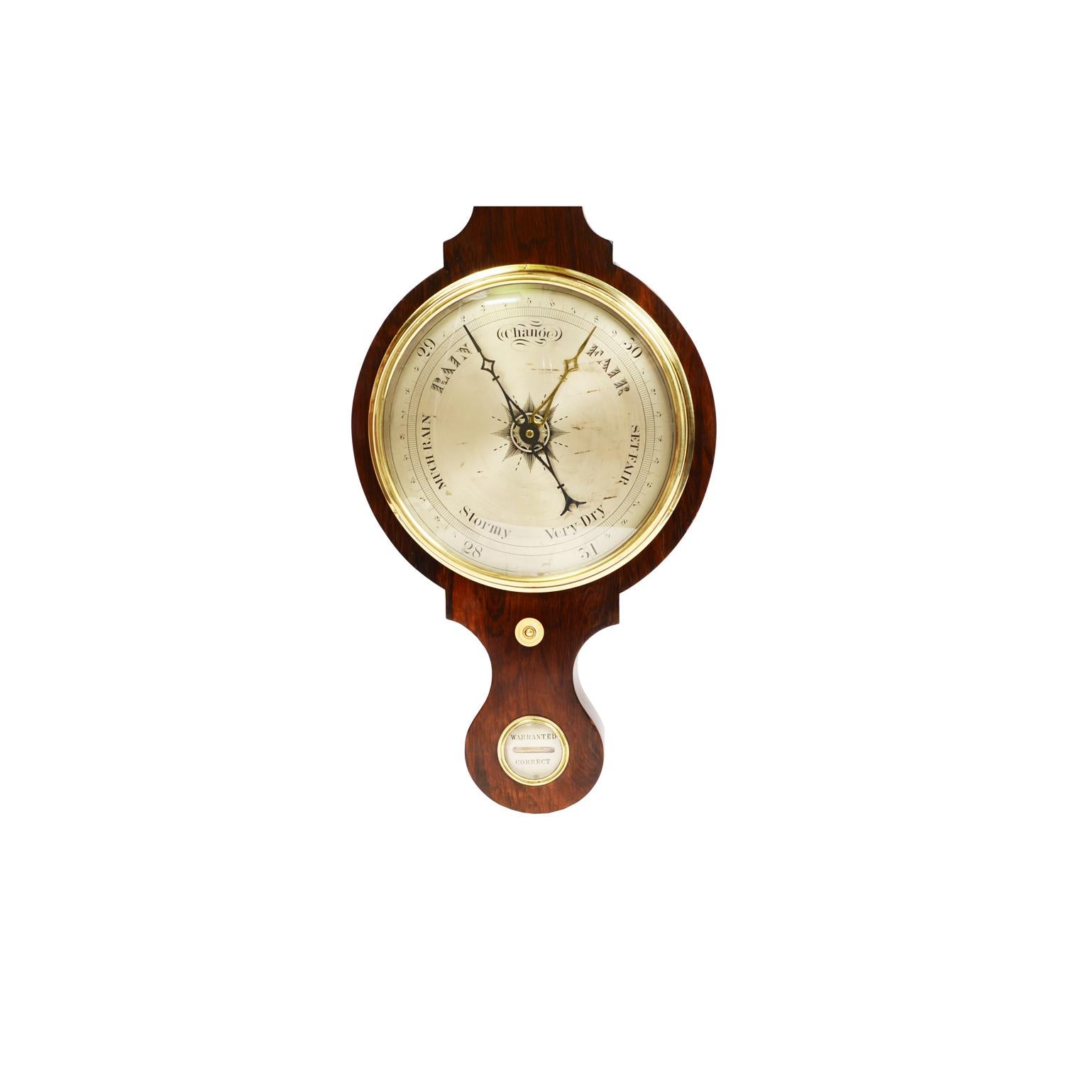 Wooden barometer measuring instrument English manufacture made in the mid 19th century, silver-plated brass dial engraved with meteorological indications and double pointer, the first one directly connected to the barometric tube indicates the