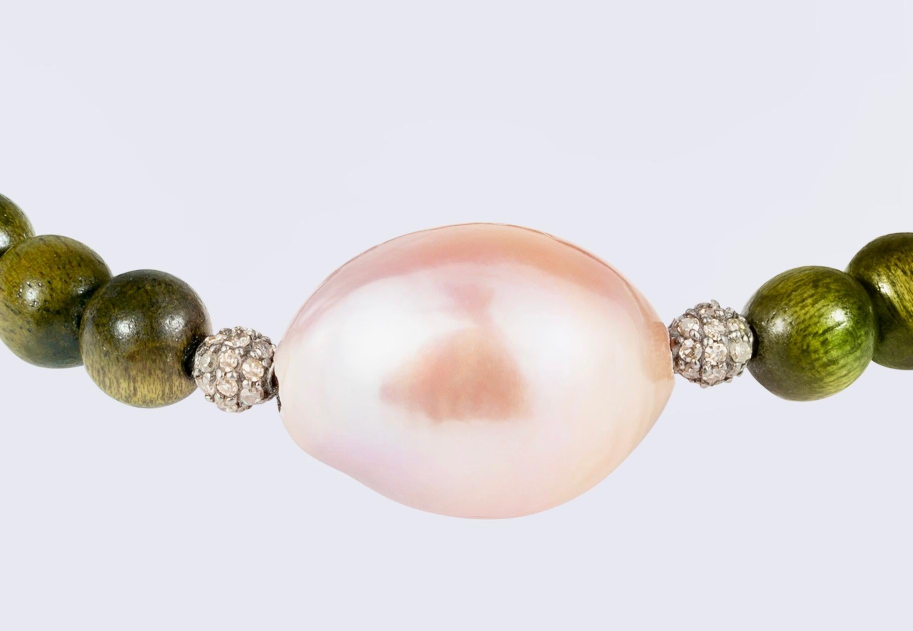 Bead Wooden bead bracelet with pink baroque pearl and diamond encrusted silver beads For Sale
