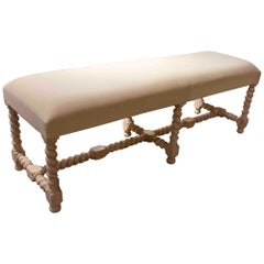 Banco de madera con patas torneadas y asiento para tapizar