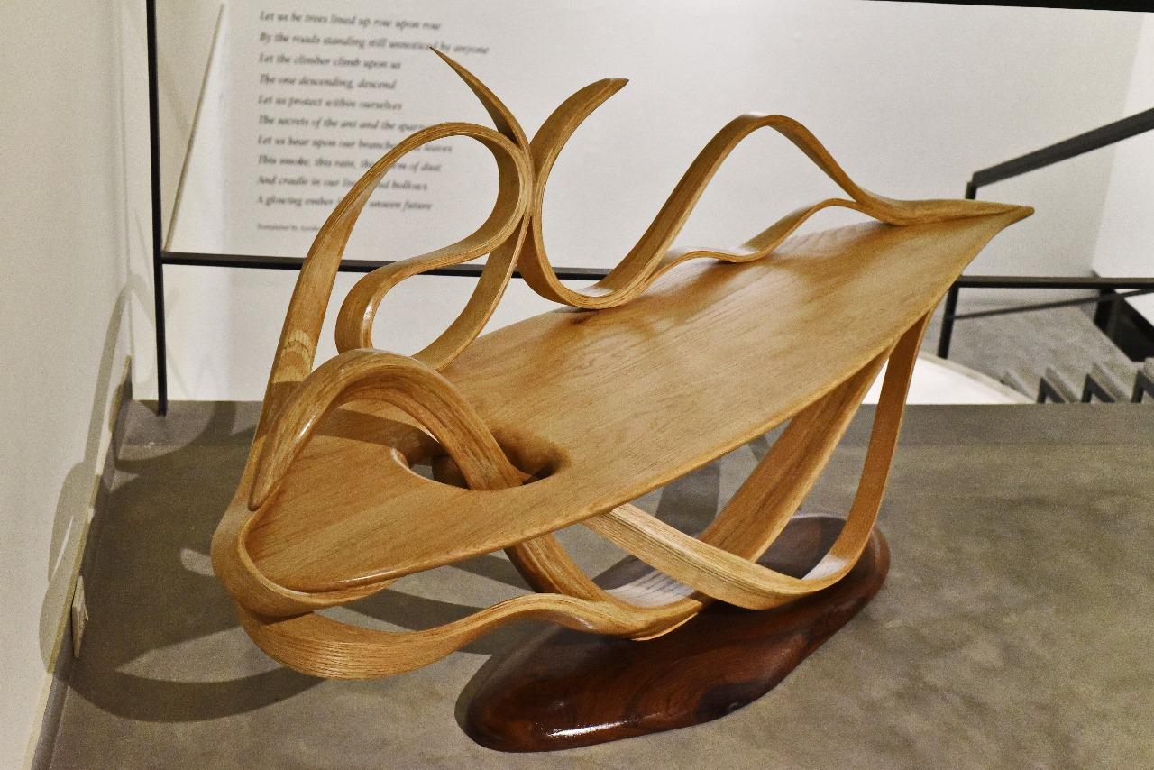 This piece is a combination of various design elements and techniques that have been honed over the years, along with elements that are unique to this piece. This piece is a display of wood bending, sculpting and joinery techniques that have been