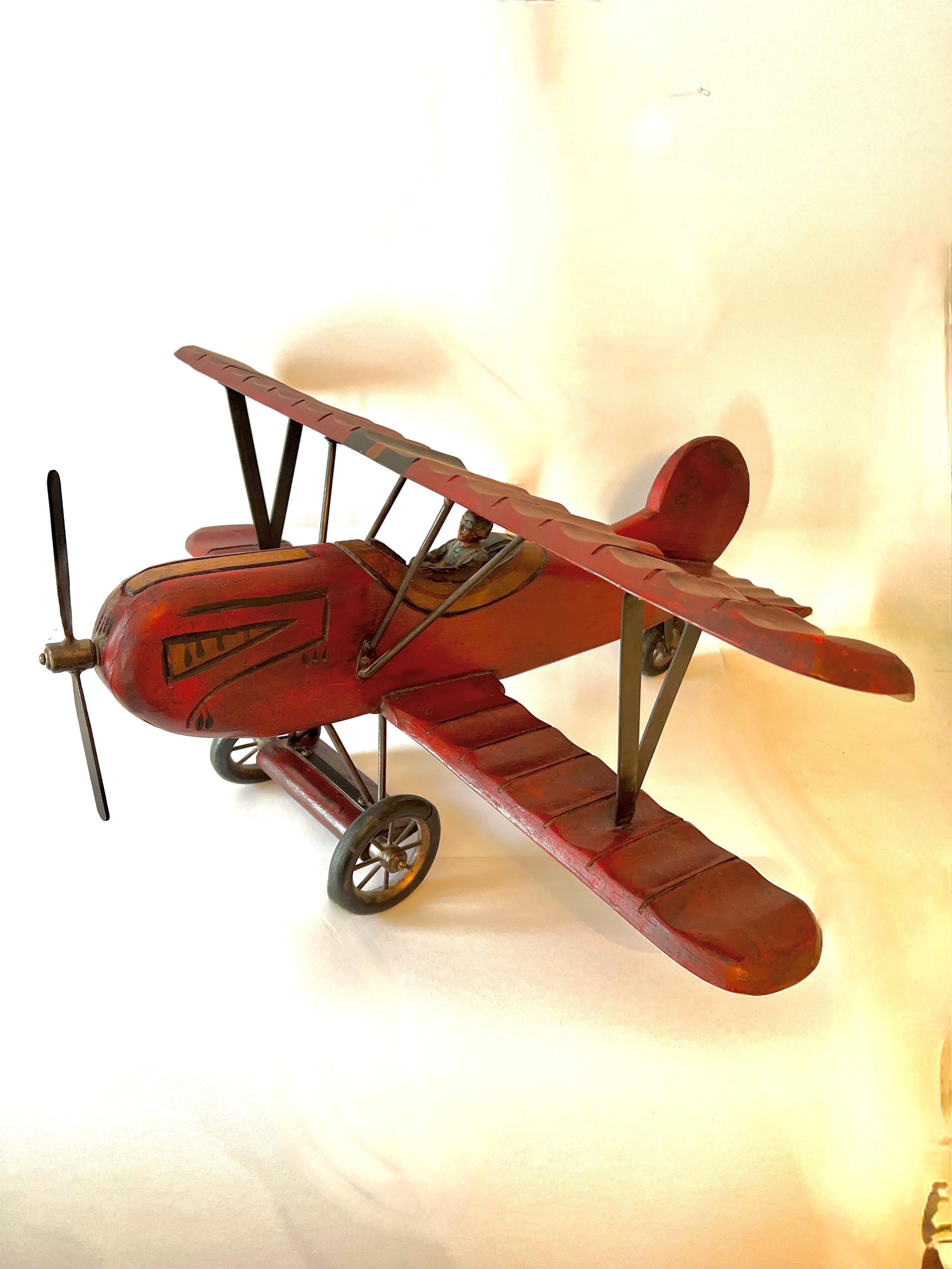 Hand-Crafted Wooden Biplane with Rubber Wheels, Metal Propeller  and Pilot