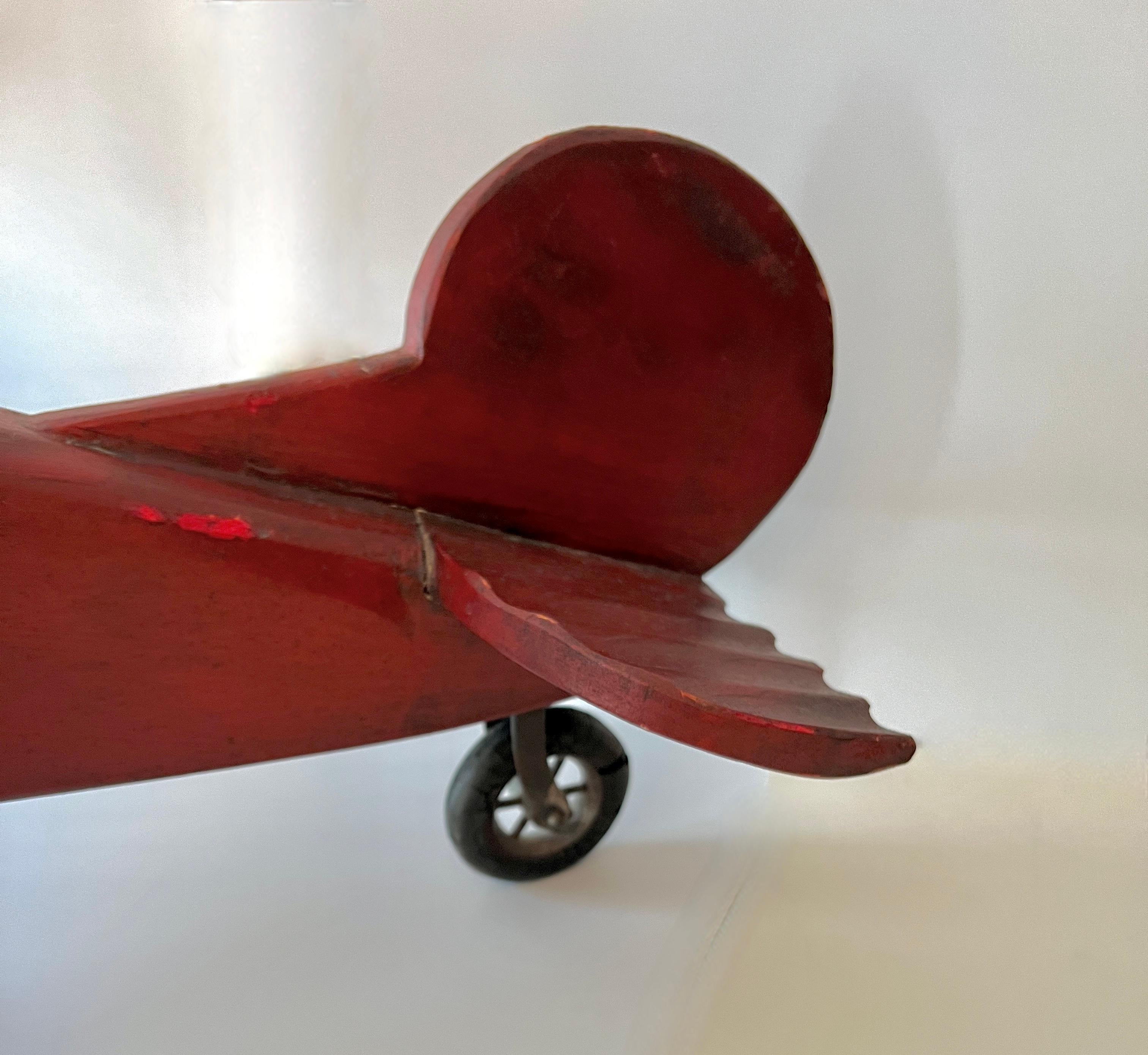 Wooden Biplane with Rubber Wheels, Metal Propeller  and Pilot 1