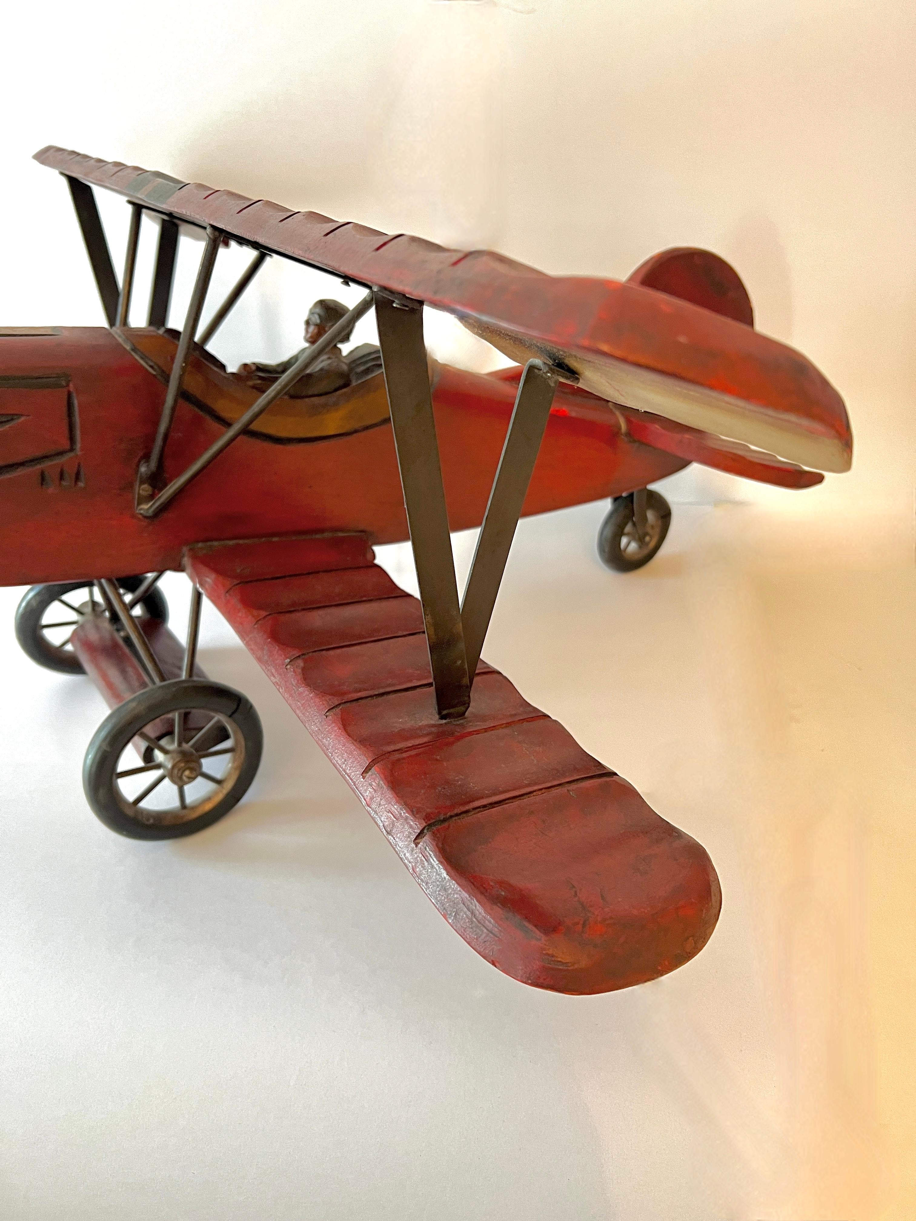 Wooden Biplane with Rubber Wheels, Metal Propeller  and Pilot 2