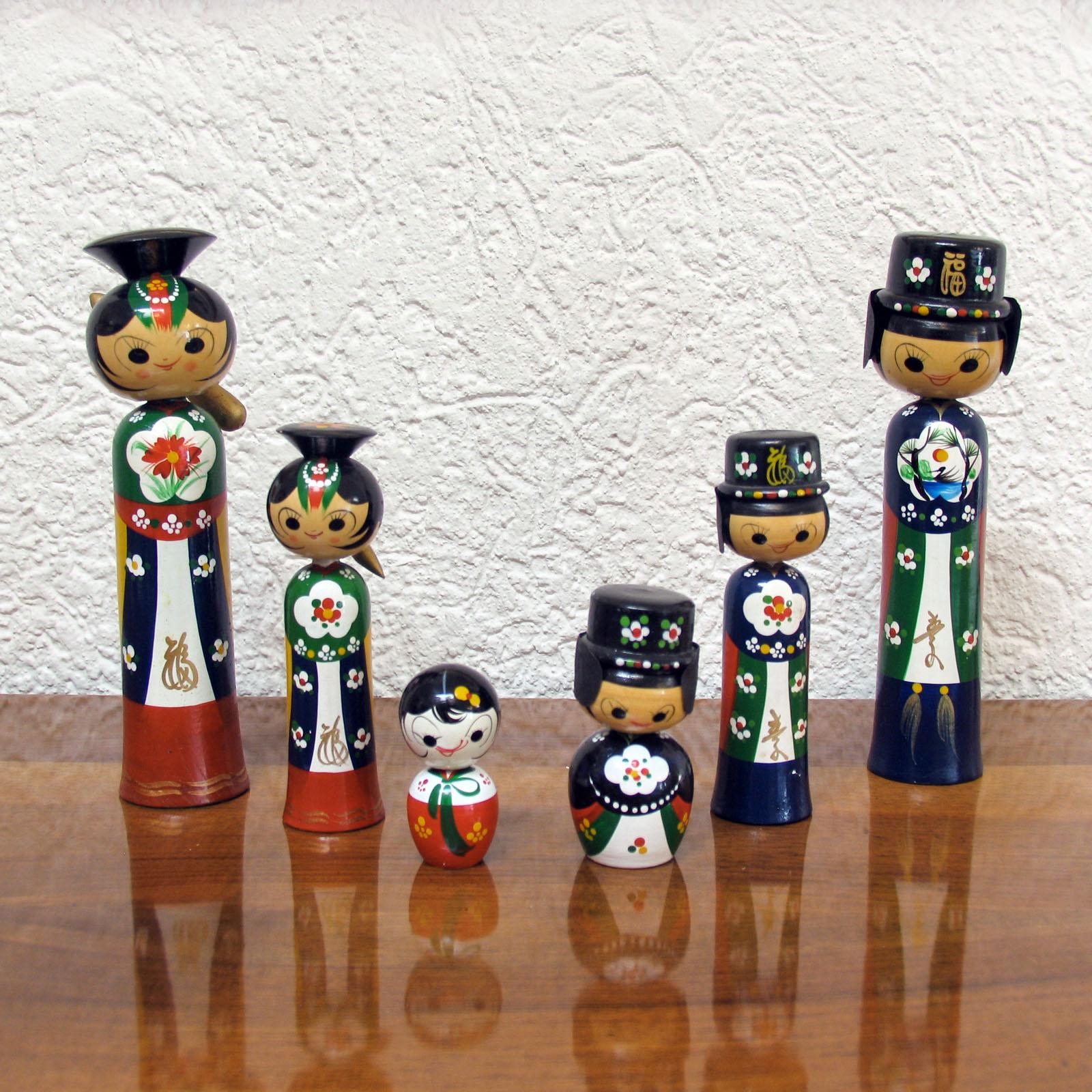 A beautiful collection of 6 vintage Korean bobble head wedding dolls of the 1960s
Handmade from wood, these beautifully decorated Kokeshi style dolls are bobble heads and very old. Dating to the 1960's they are intricate and beautifully decorated.