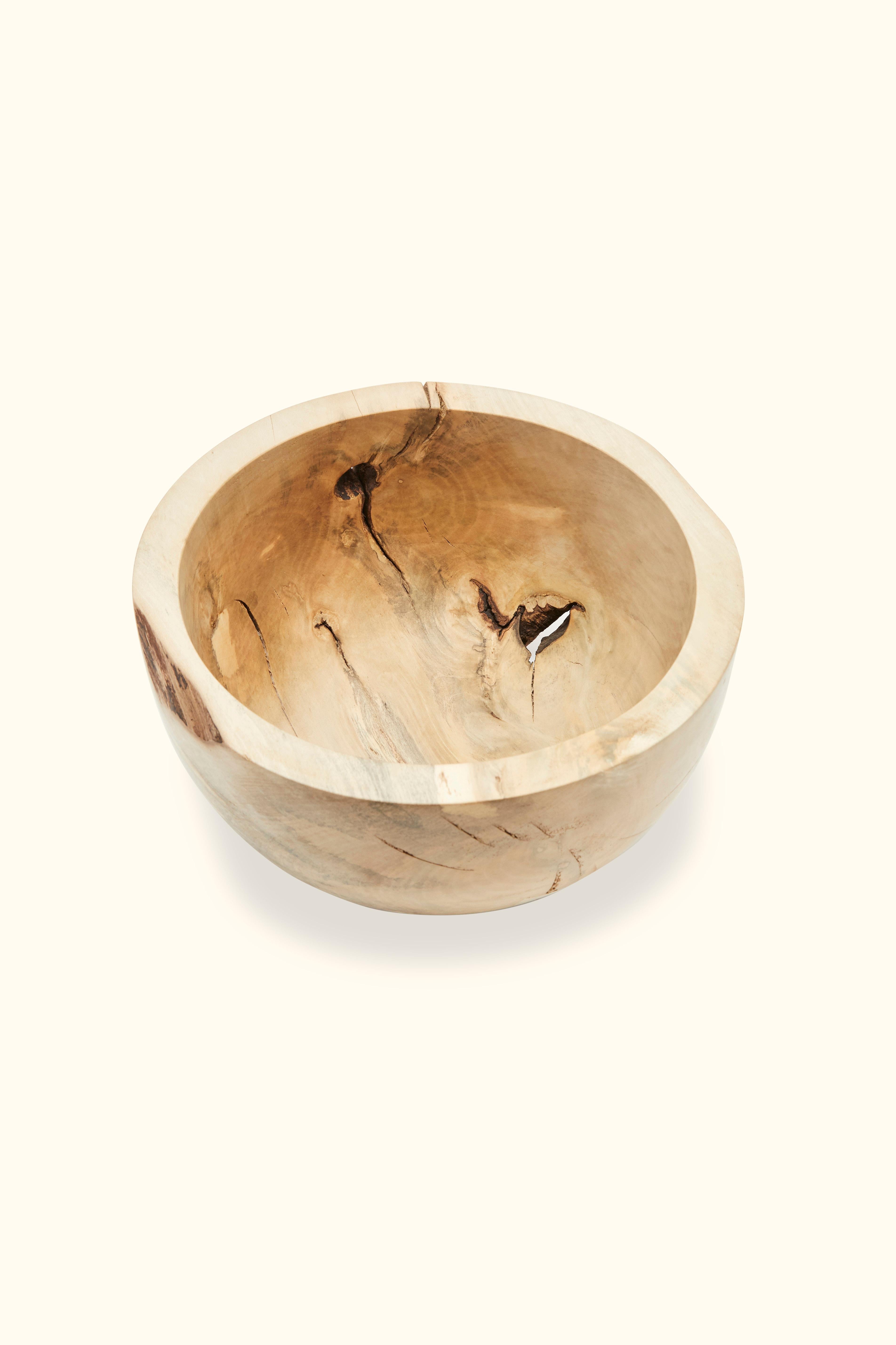 Wooden Bowl by Wyatt Speight Rhue.

Wood species, dimensions, color and grain pattern may vary.
