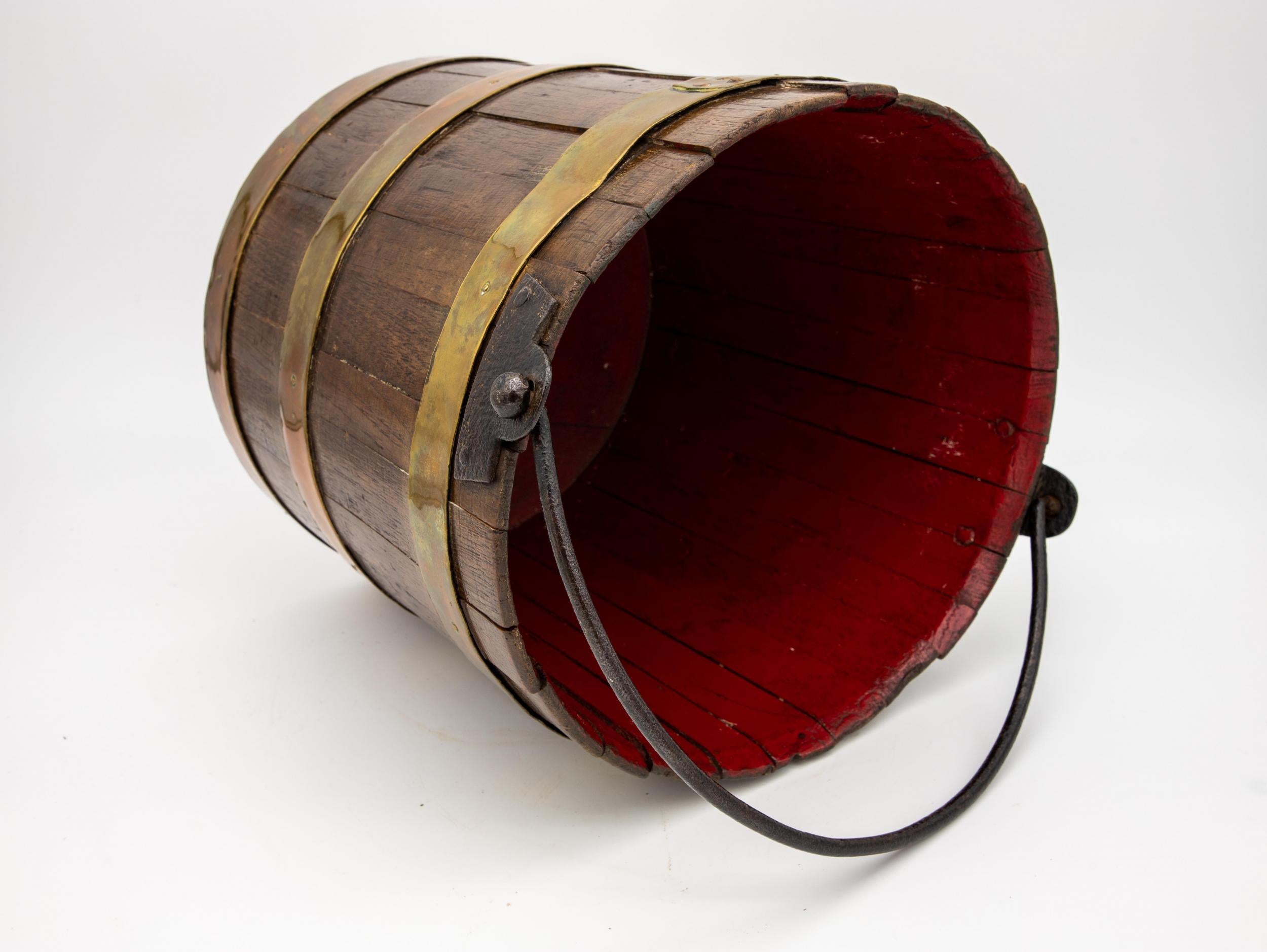 Wooden Bucket with Red Interior and Brass Accents 1