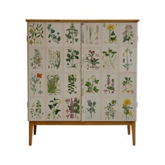 Vintage Wooden Cabinet with Nordens Flora Illustrations